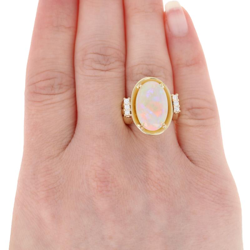 5.65 Carat Oval Cabochon Cut Opal and Diamond Ring, 18 Karat Yellow Gold In Excellent Condition In Greensboro, NC