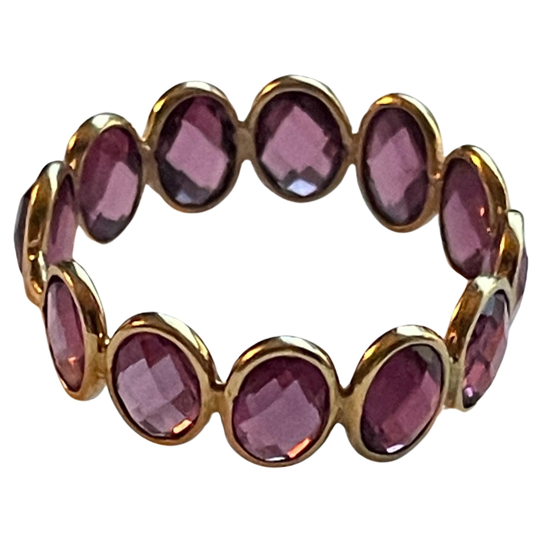 5.66 Carat Oval Checker Cut Rhodolite 18K Gold Eternity Band Ring For Sale