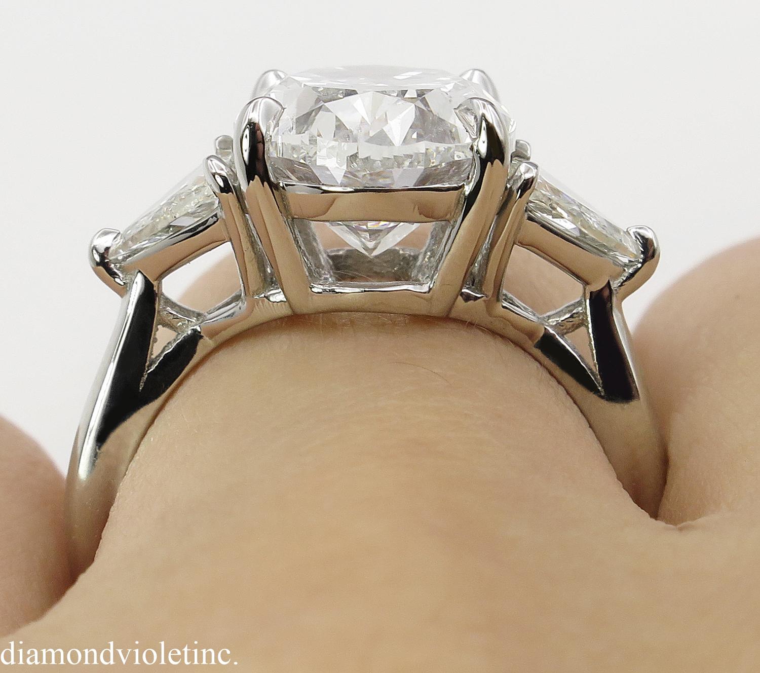 GIA 5.67 Carat Oval Diamond 3-Stone Engagement Platinum Ring  11