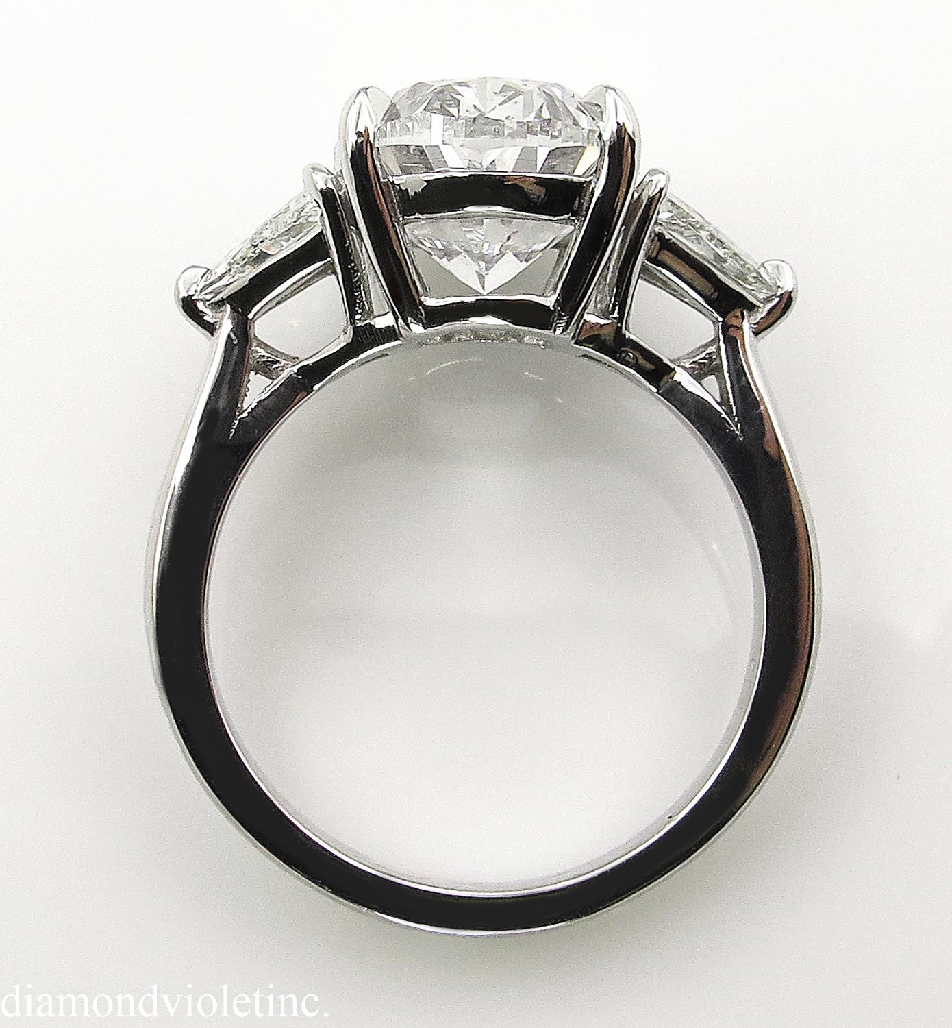 GIA 5.67 Carat Oval Diamond 3-Stone Engagement Platinum Ring  2