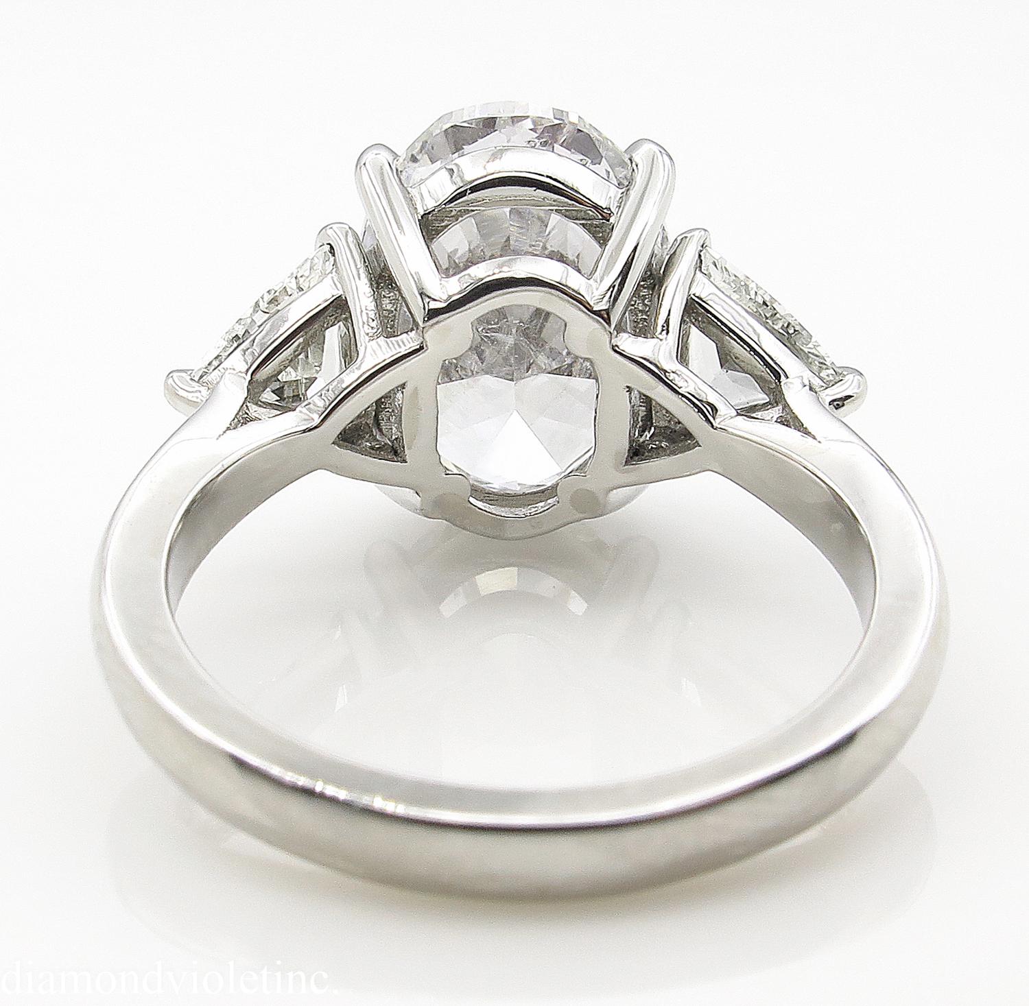 GIA 5.67 Carat Oval Diamond 3-Stone Engagement Platinum Ring  3