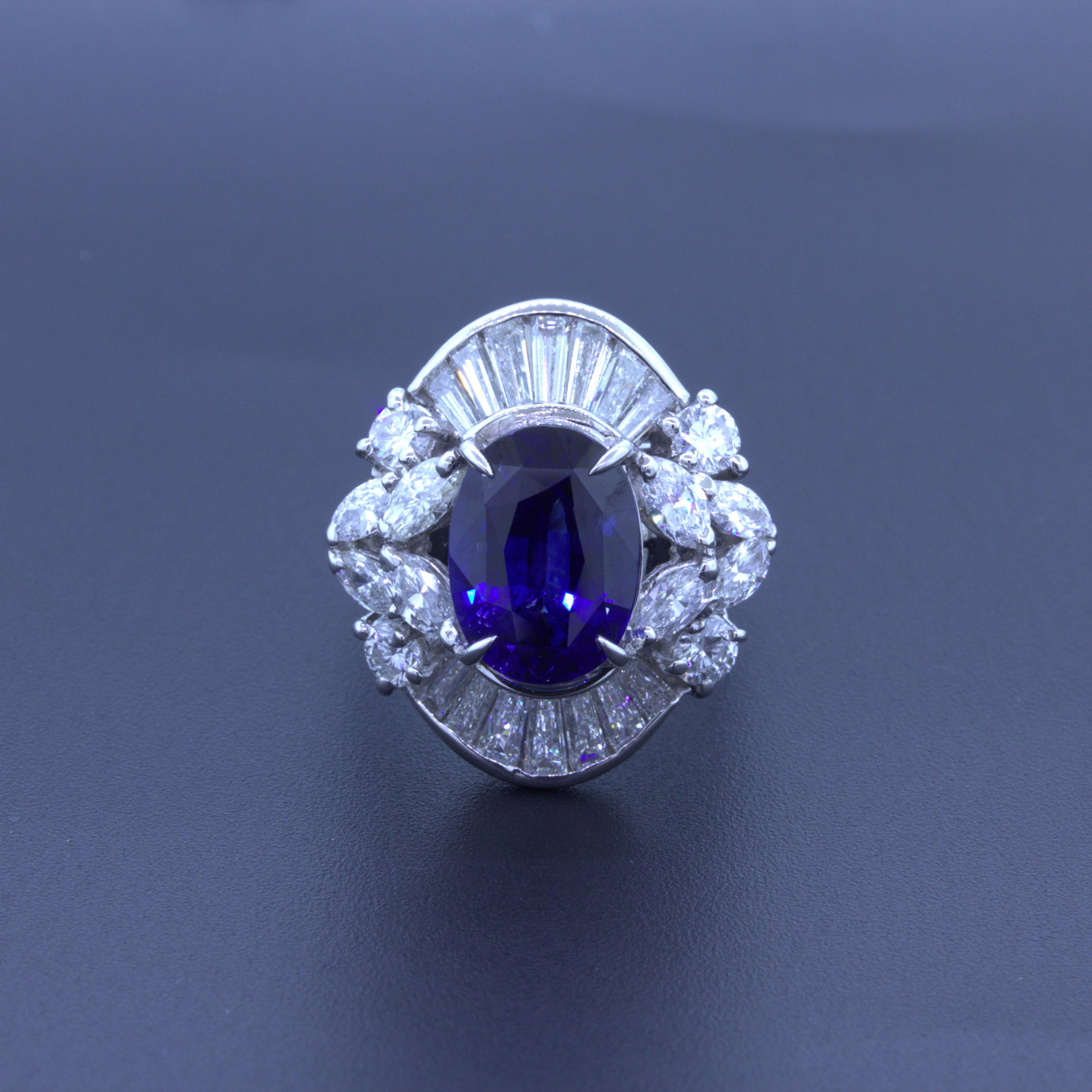 An elegant and stylish ring featuring a fine 5.67 carat blue sapphire. It has a rich and vibrant blue color with excellent brilliance and light return. It is complemented by 3.02 carats of marquise, baguette, and round brilliant-cut diamonds set