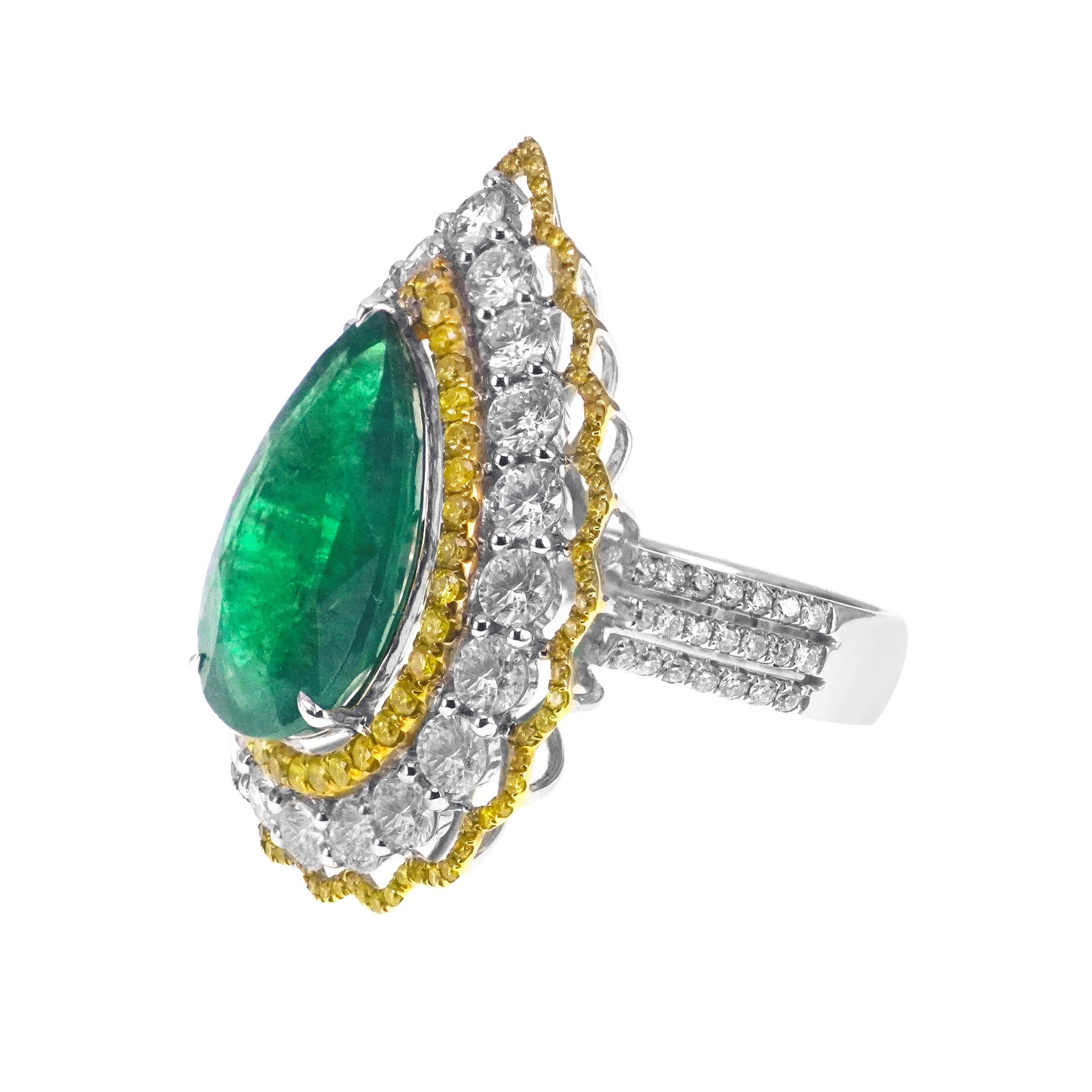 A sumptuous soothing green emerald weighing 5.67 carat is set with 0.62 carat of vivid yellow round brilliant diamond. The ring is also accented by 2.11 carat of white round brilliant diamond.  The details of the diamond are mentioned below:
Color:
