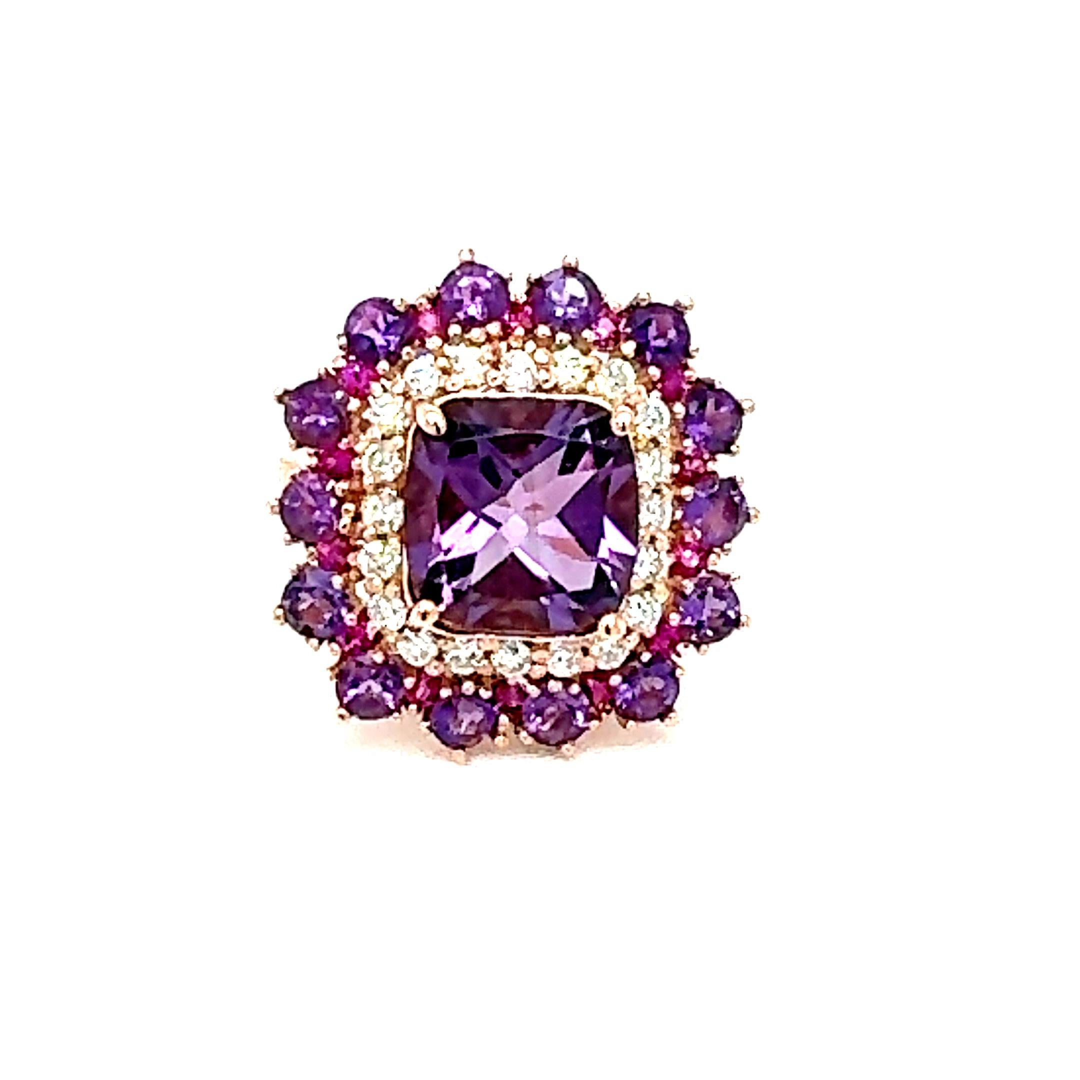 5.67 Carat Cushion Cut Amethyst Pink Sapphire Diamond Rose Gold Cocktail Ring

Beautiful to say the Least! 

This Ring has a magnificent Cushion Cut Amethyst that weighs 3.93 Carats and is surrounded by 14 Round Cut Amethysts that weigh 1.43 Carats