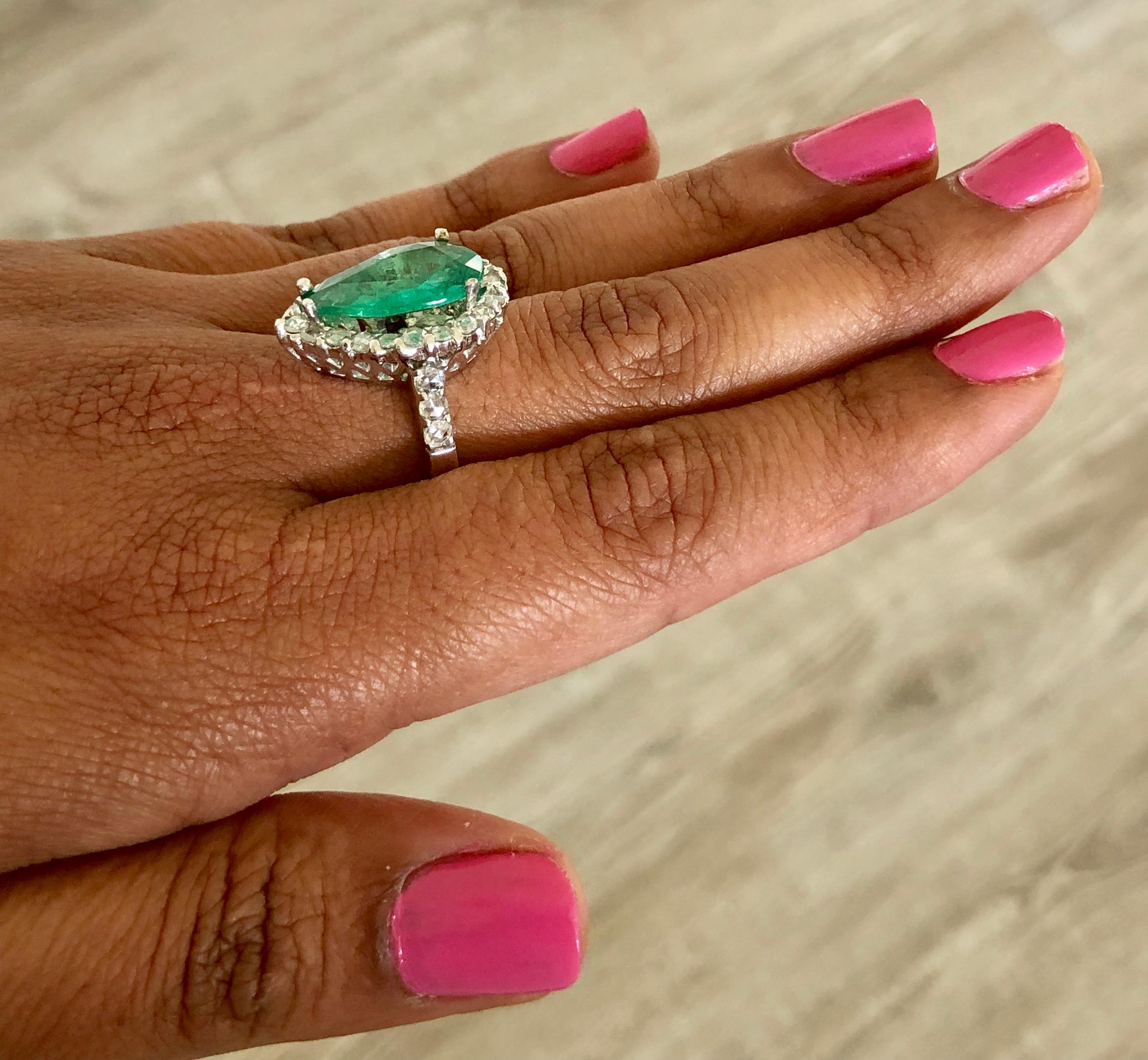 Women's 5.67 Carat Pear Cut Emerald Diamond 14 Karat White Gold Vintage Ring For Sale