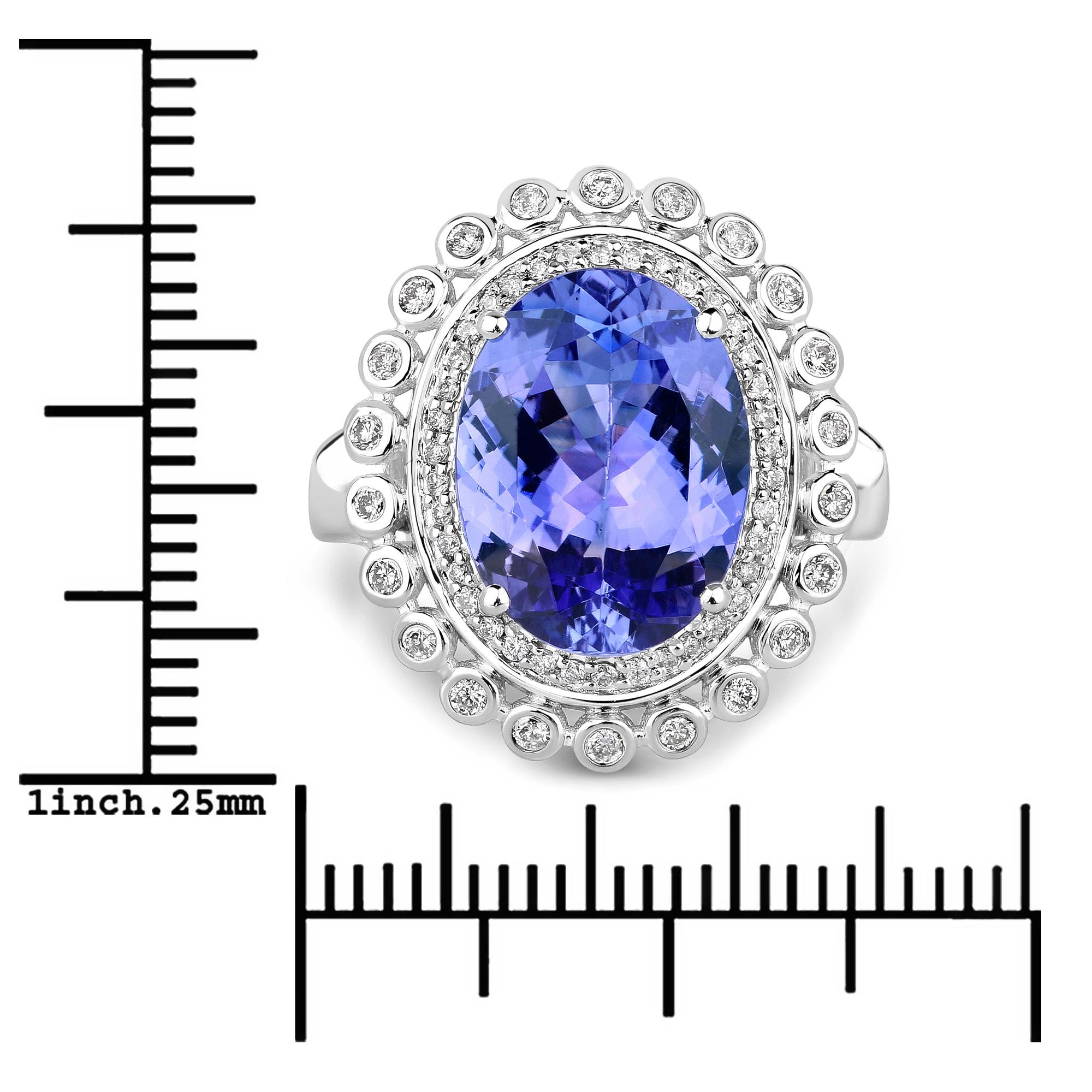 5.67 Carat Genuine Tanzanite and White Diamond 14 Karat White Gold Ring In New Condition In Great Neck, NY