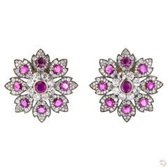 Orecchini in oro rosa con diamanti taglio brillante rotondo da 5.67 carati