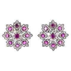 Orecchini in oro rosa con diamanti taglio brillante rotondo da 5.67 carati