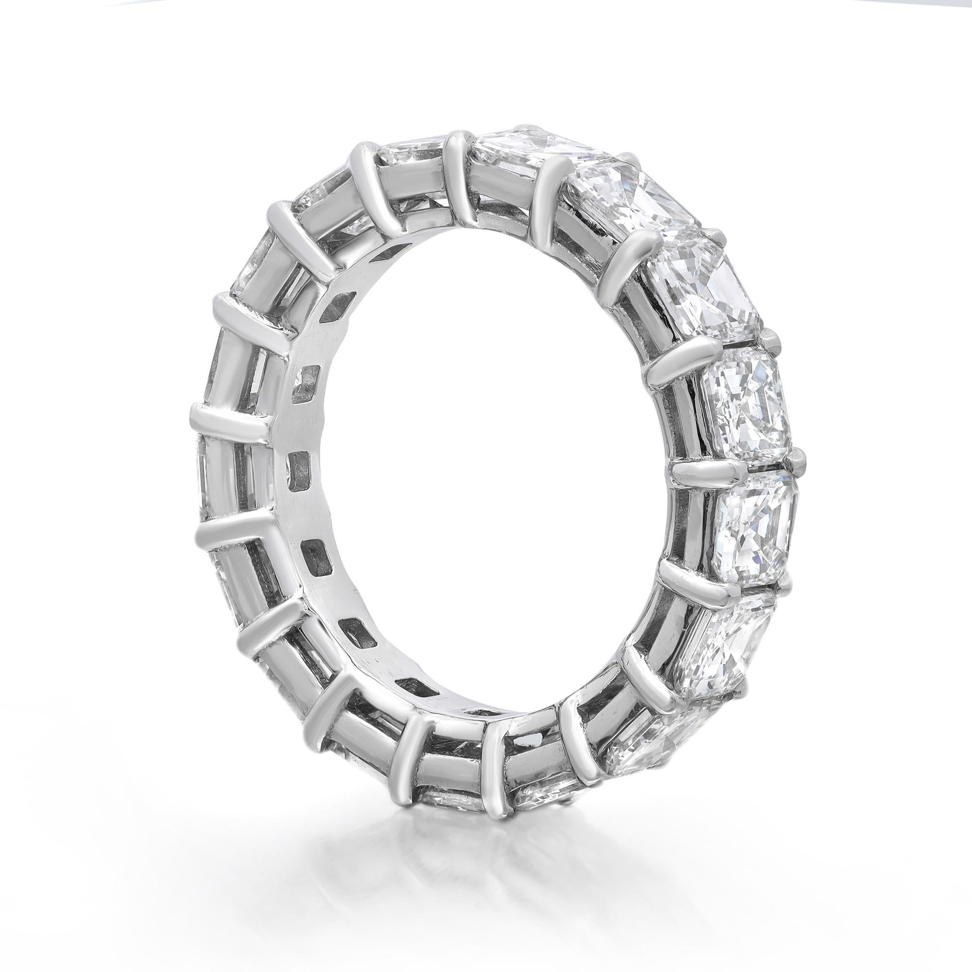 This diamond eternity band ring is a beautiful take on a classic style. It features 17 Asscher cut sparkling diamonds encrusted in prong setting. Crafted in platinum. Total diamond weight: 5.67 carats. Diamond quality: color G-H and clarity VS-SI.