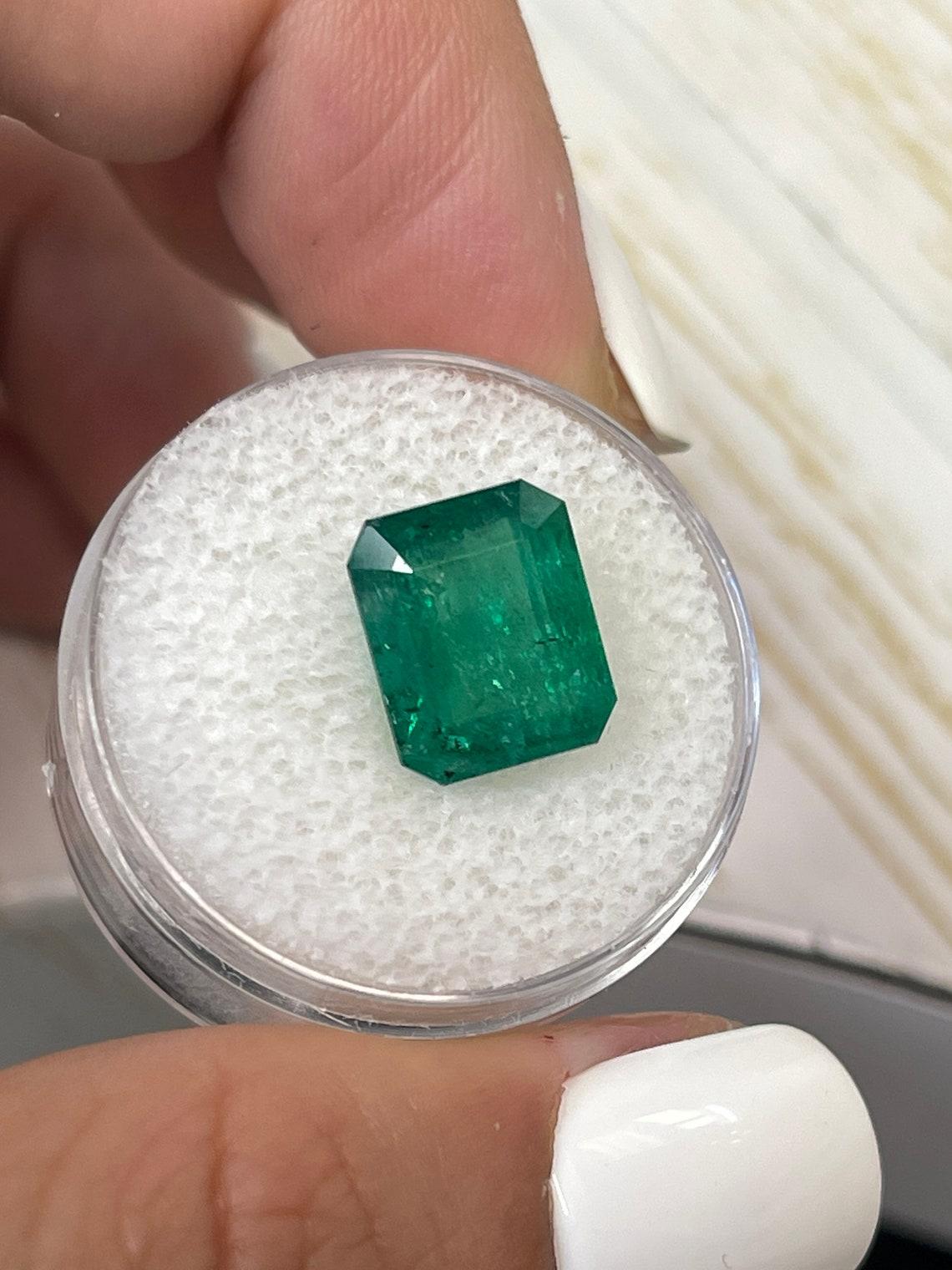 5,68 Karat 11,3x9,3 Medium Tiefgrüner sambischer Smaragd im Smaragdschliff Mai im Zustand „Neu“ im Angebot in Jupiter, FL
