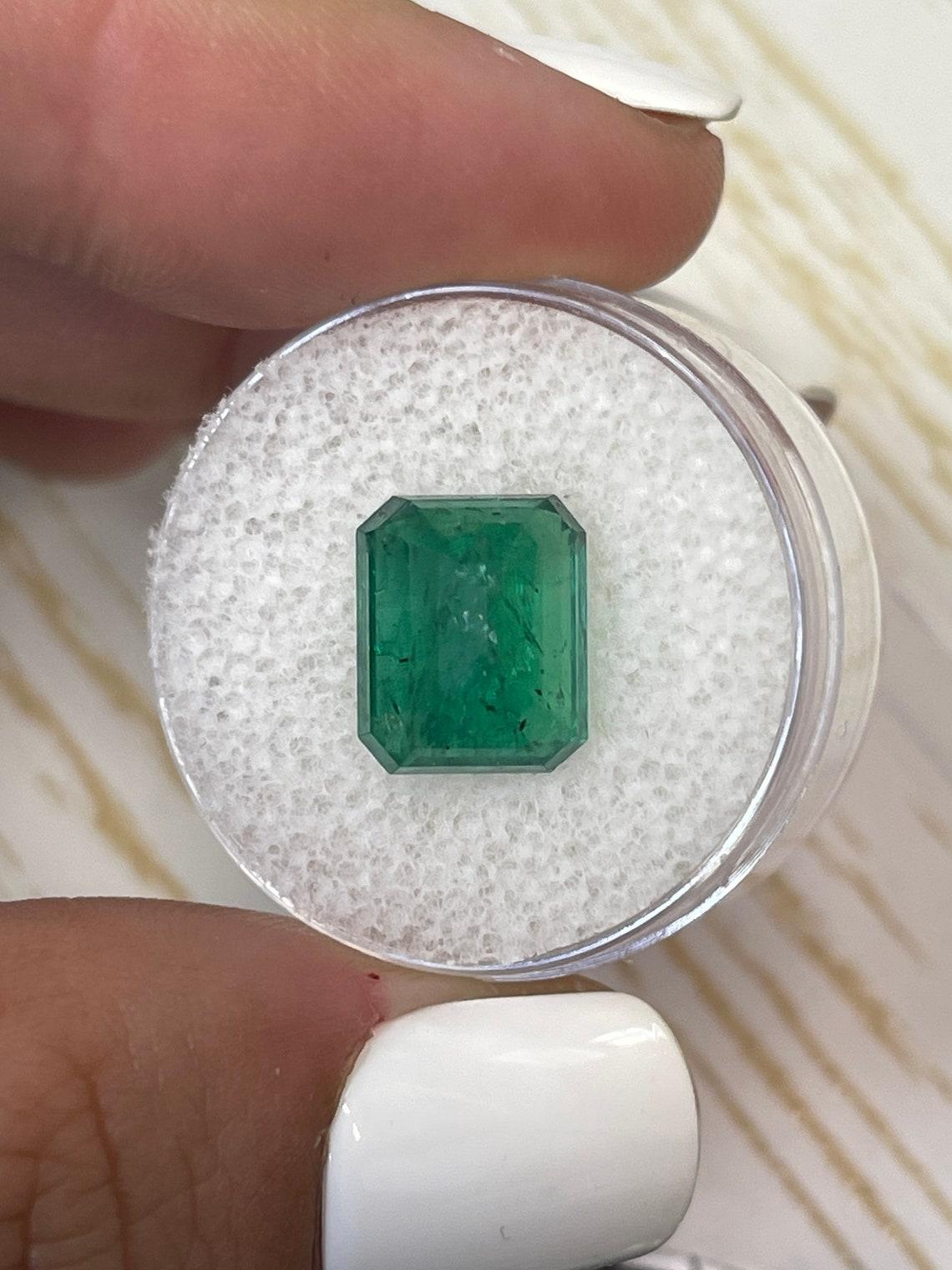 5,68 Karat 11,3x9,3 Medium Tiefgrüner sambischer Smaragd im Smaragdschliff Mai im Angebot 2