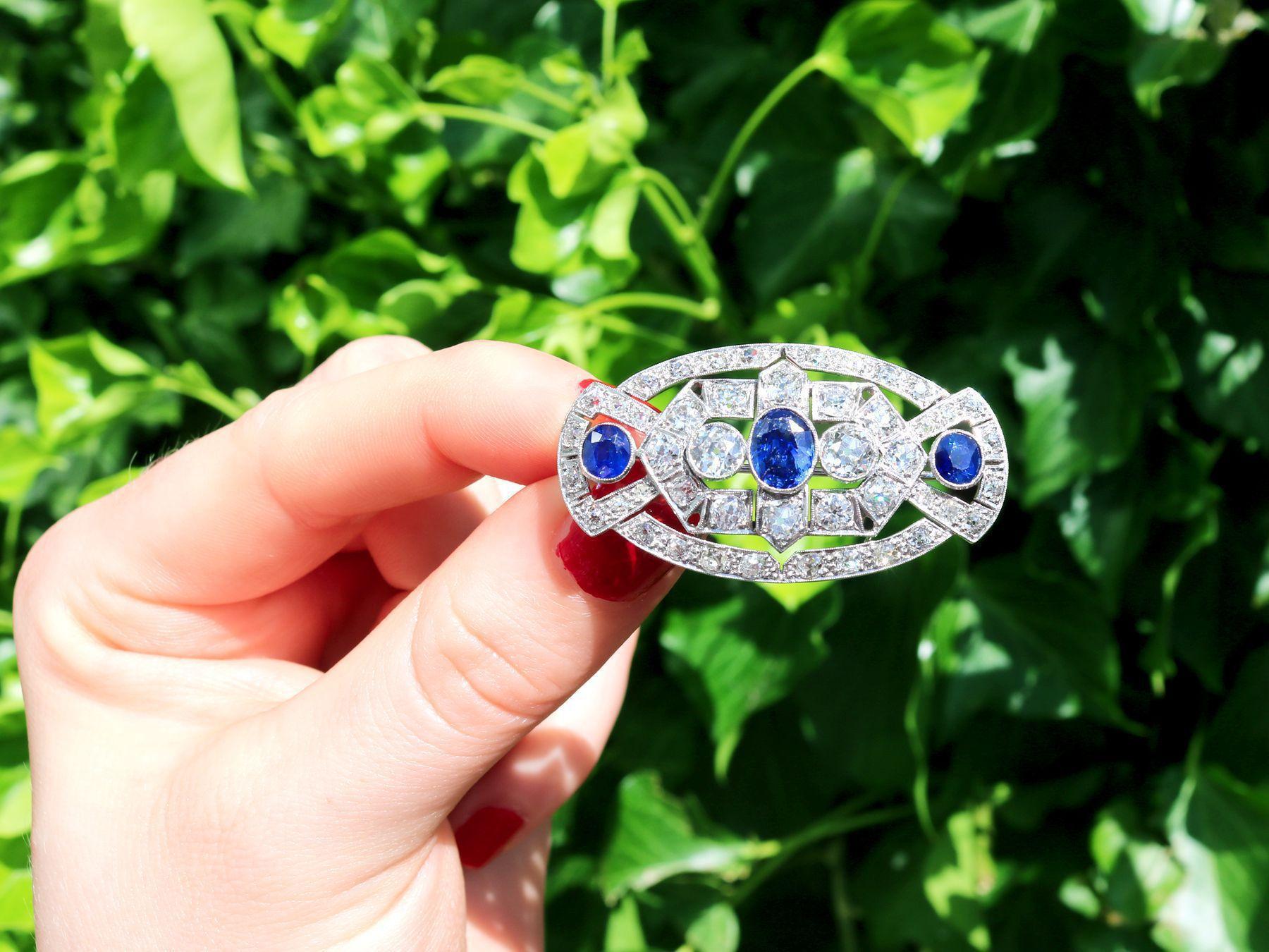 A stunning antique Art Deco 5.68 carat diamond and 2.35 carat sapphire, platinum brooch; part of our diverse antique jewelry and estate jewelry collections.

This stunning, fine and impressive antique sapphire and diamond brooch has been crafted in