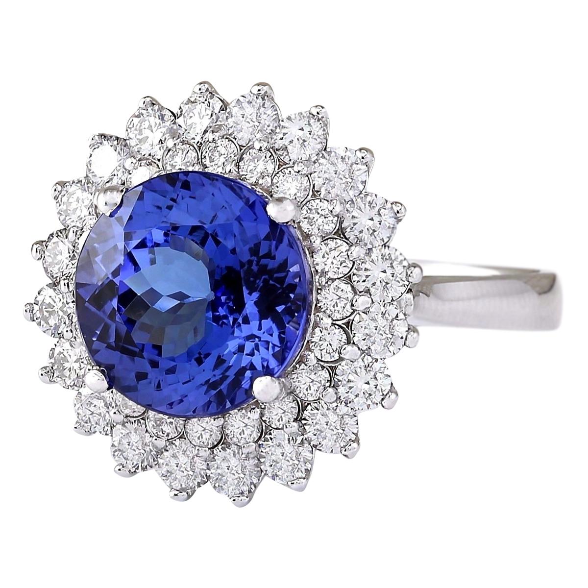 Stamped: 14K White Gold
Total Ring Weight: 6.1 Grams
Total Natural Tanzanite Weight is 4.48 Carat (Measures: 9.50x9.50 mm)
Color: Blue
Total Natural Diamond Weight is 1.20 Carat
Color: F-G, Clarity: VS2-SI1
Face Measures: 17.20x17.20 mm
Sku: