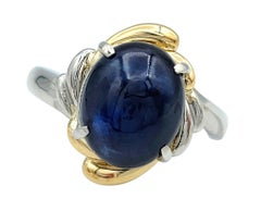 5.68 Carat Oval Cabochon Sapphire Ring in Platinum and 18 Karat Yellow Gold