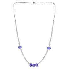 5.68 Carat Oval Tanzanite 2.82 Carat Diamond Station Necklace 18K White Gold