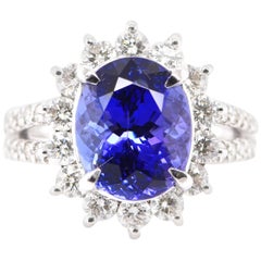 Bague en platine sertie d'un halo de tanzanite naturelle de 5,69 carats et de diamants