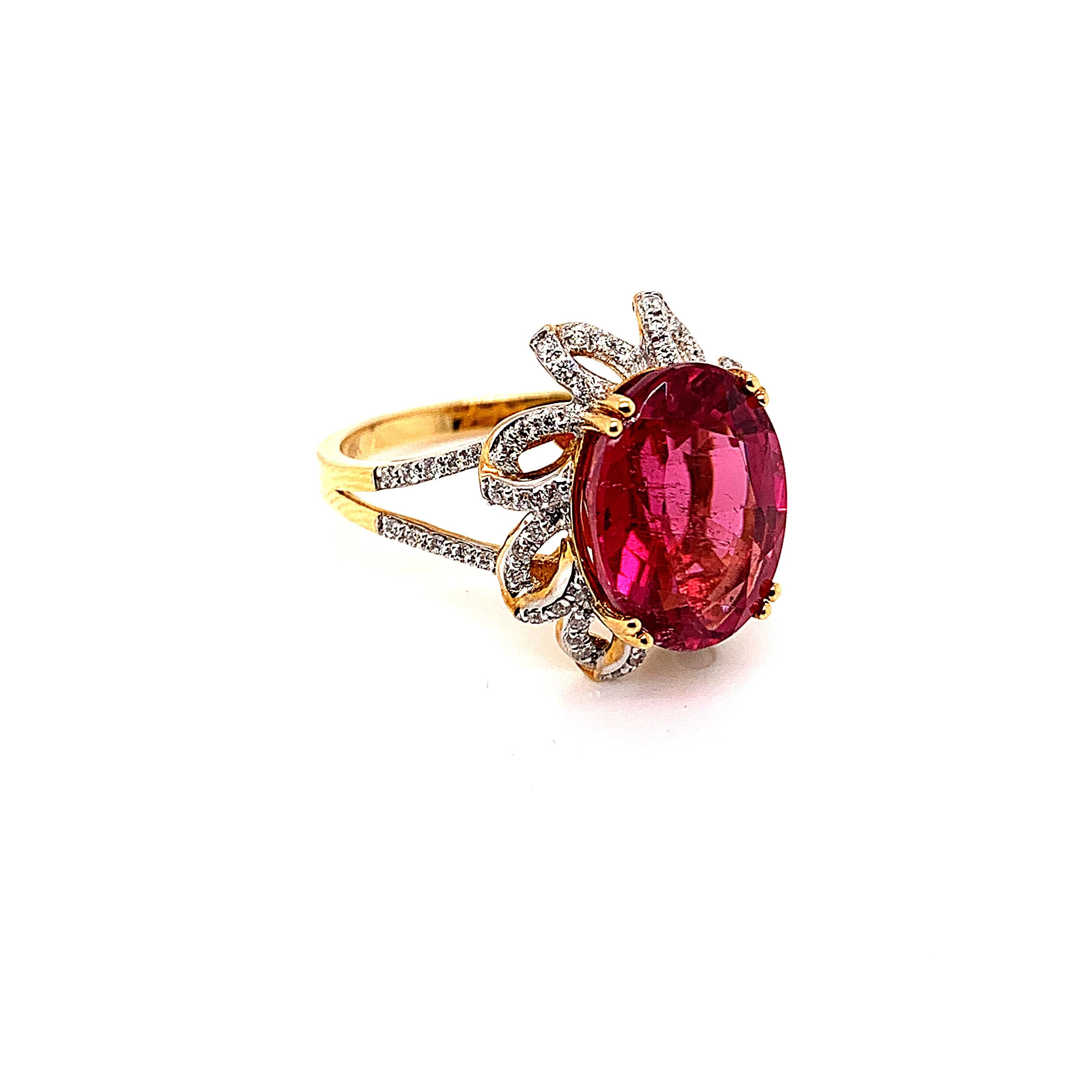 Contemporary 5.69 Carat Oval Shaped Rubelite Ring in 18 Karat Yellow Gold with Diamonds For Sale