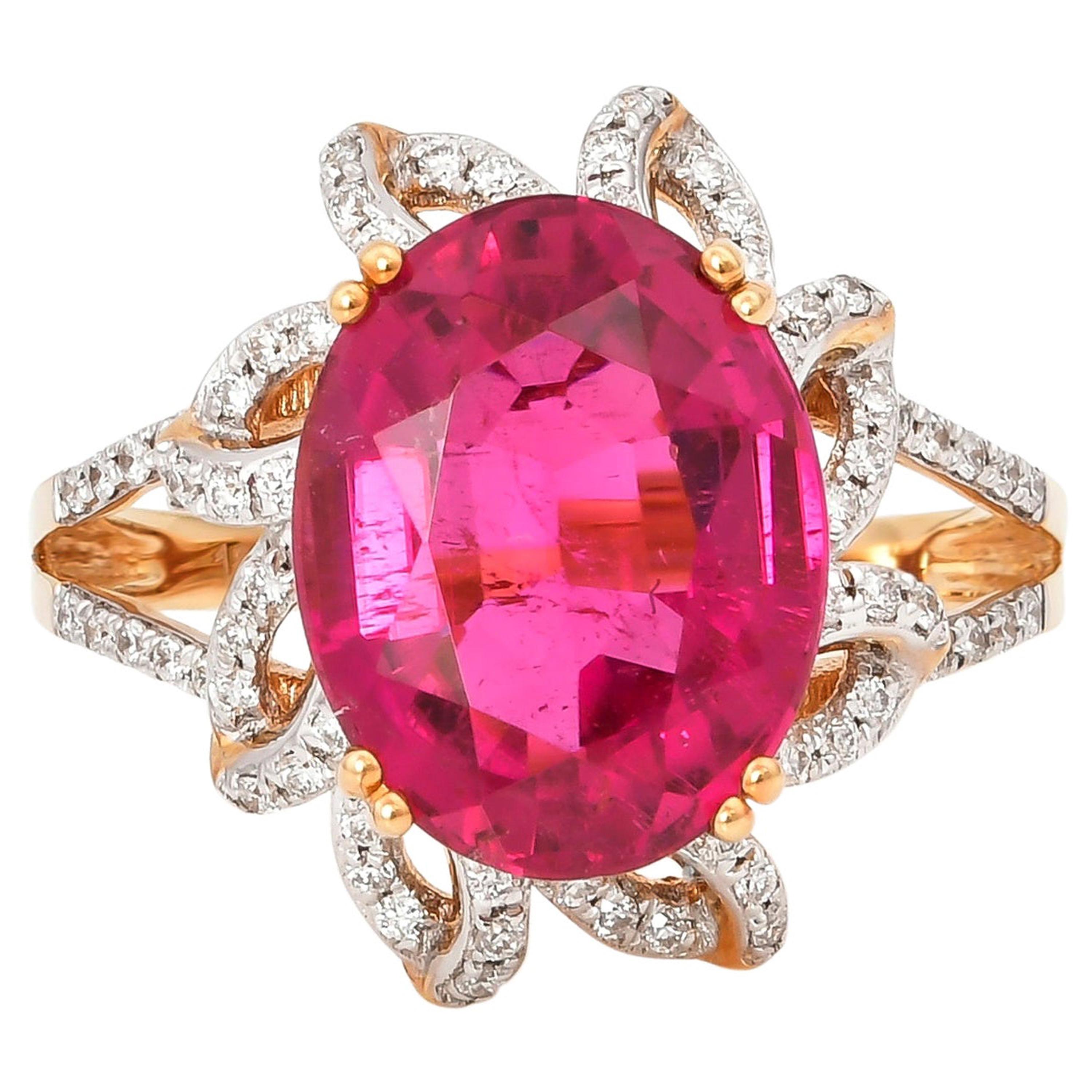5.69 Carat Oval Shaped Rubelite Ring in 18 Karat Yellow Gold with Diamonds For Sale