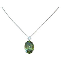 5.69 ct Oval Sphene and Round Diamond Pendant Necklace in Platinum