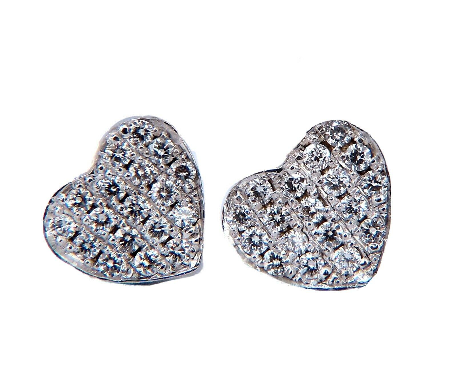 Heart pave diamond earrings.

.56 carat natural round diamonds

G color vs2 clarity

14 karat white gold 3.6 grams

Earrings measure 8.4 x 9.1 mm

$3500 appraisal certificate to accompany