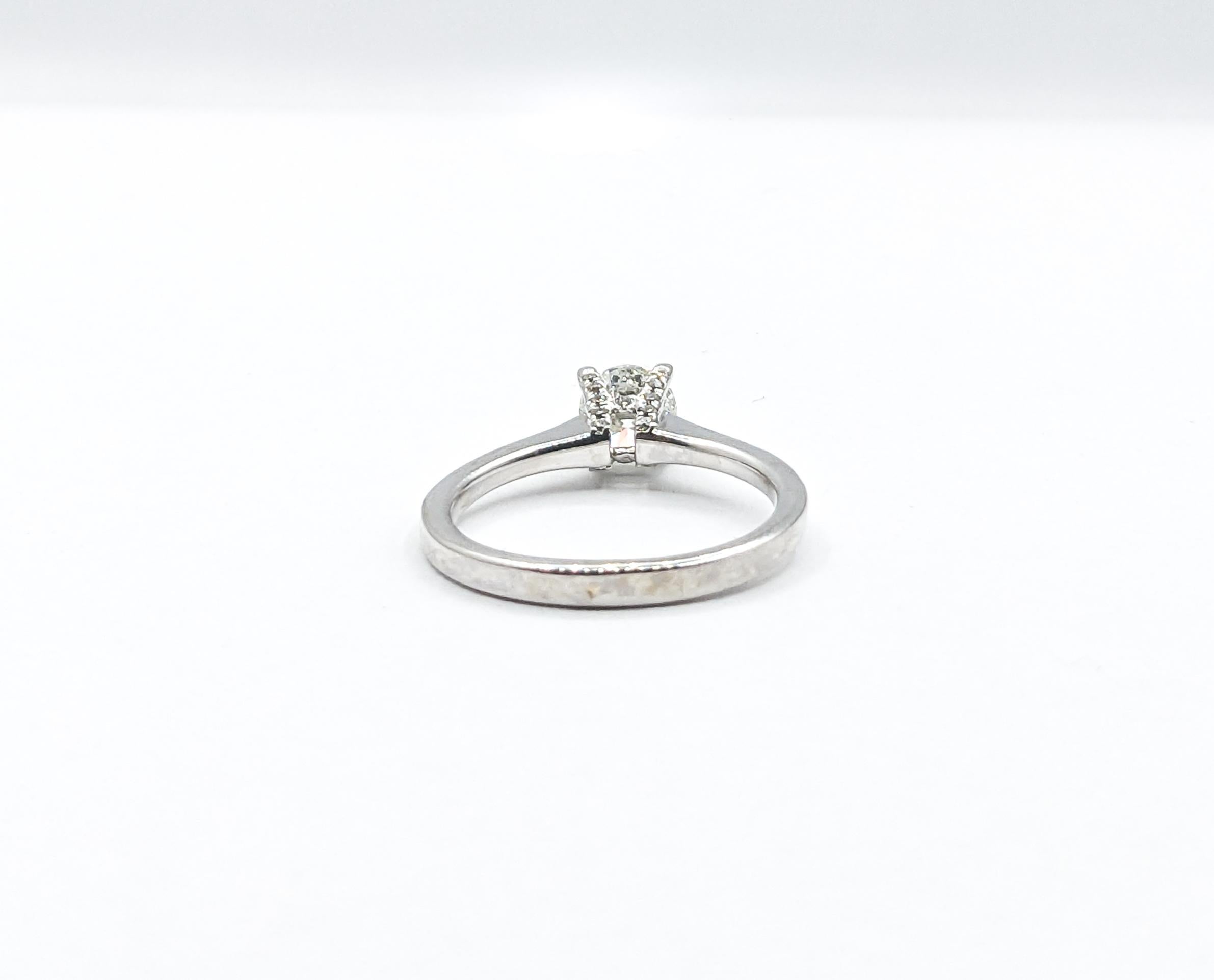 Round Cut .56ctw Diamond Ring In White Gold For Sale