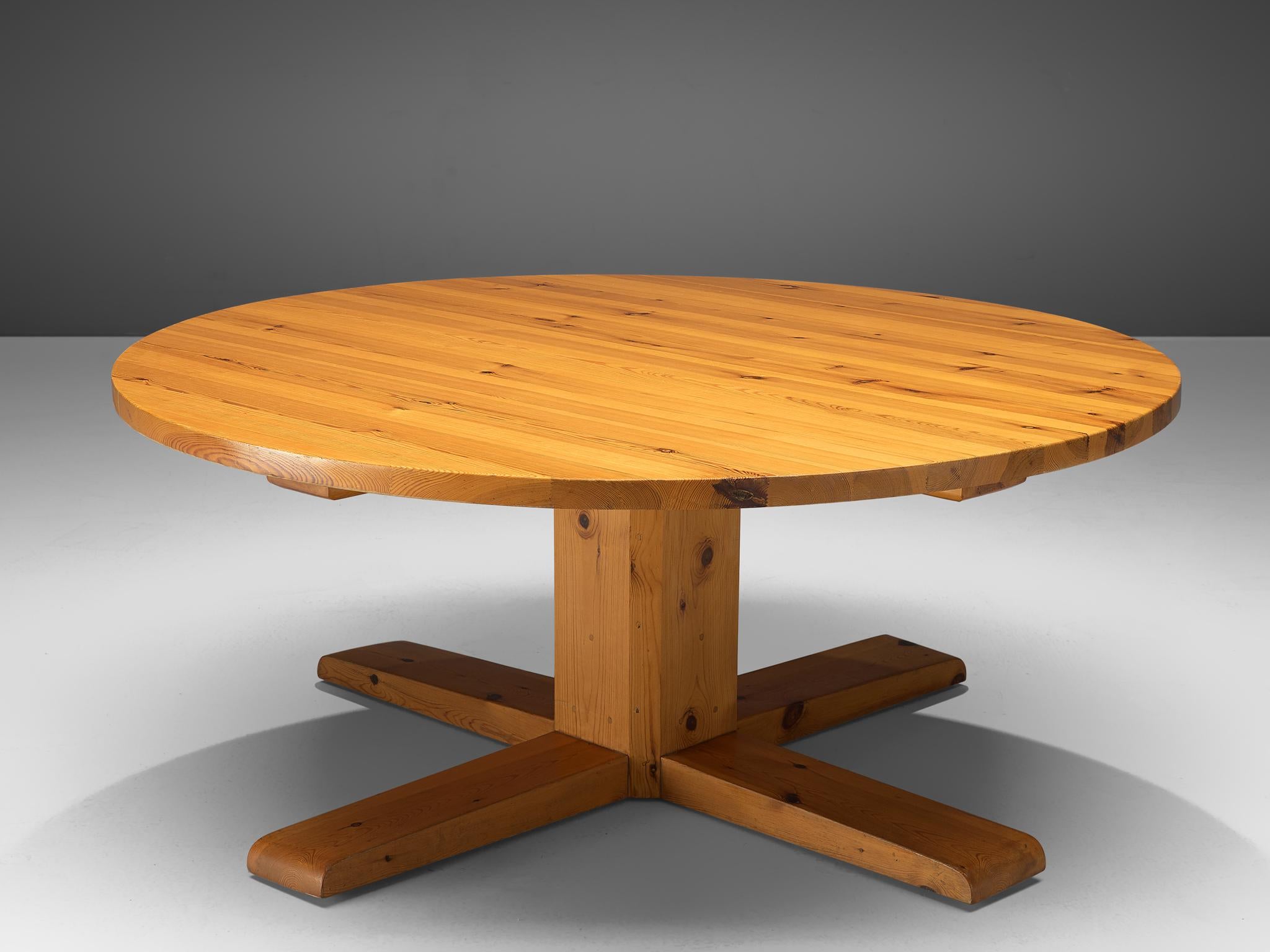 Large dining table, solid pine, Spain, 1950s

This remarkable table holds a strong expression due to several aspects that are all typical for Spanish Midcentury design. First the use of solid pine wood holds a rural and robust aesthetic. Secondly,