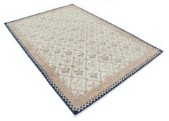 5.6x7.8 ft Hand Knotted Beige and Blue Wool Rug with Geometric Floral Design