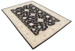 5.6x7.8 ft Hand Knotted Floral Area Rug with Black Field and Beige Border