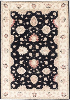 5.6x8 ft Hand Knotted Floral Area Rug with Black Field and Beige Border