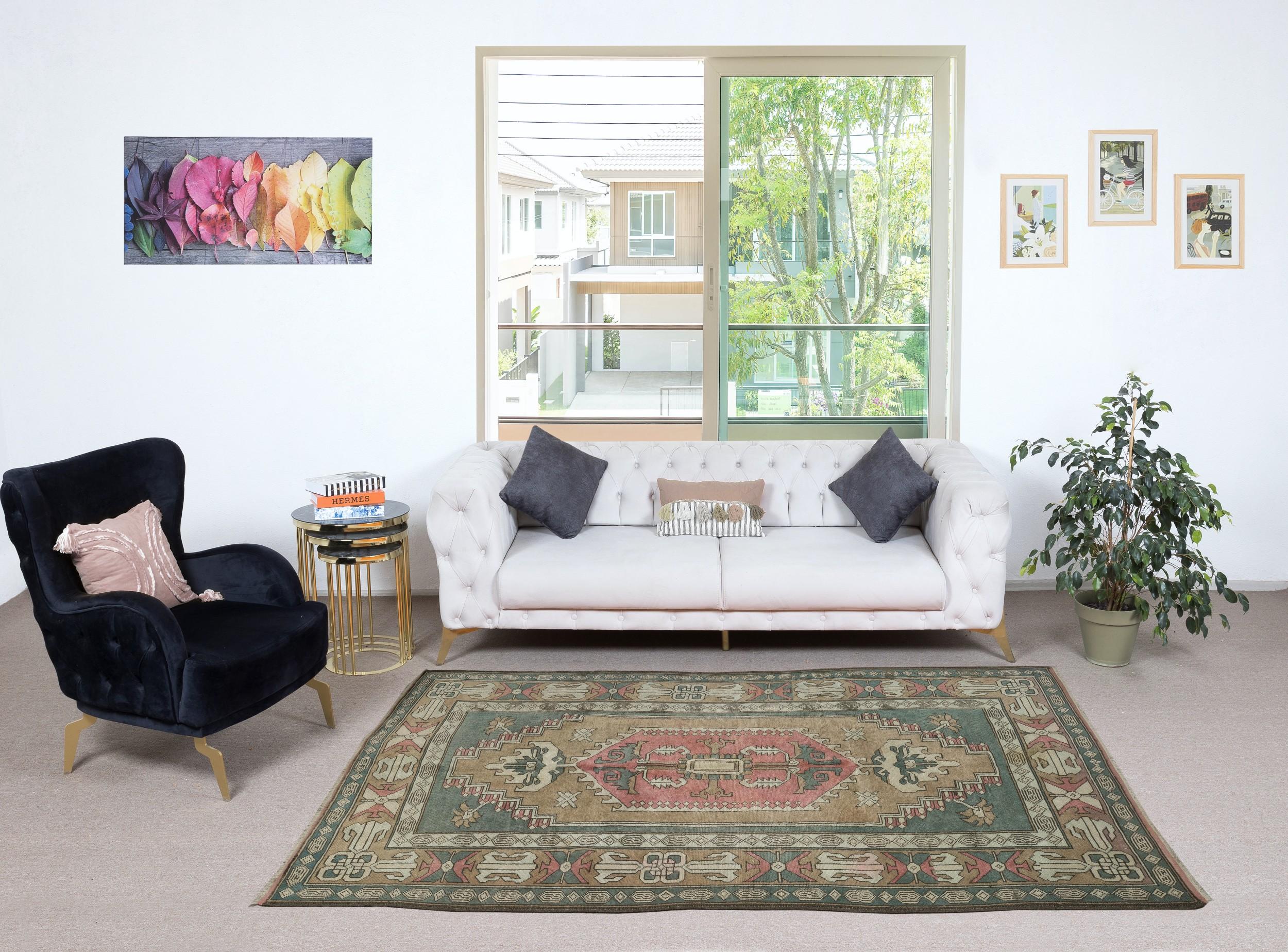 Add a touch of timeless elegance to your home with this traditional vintage hand knotted Turkish area rug, crafted from 100% premium wool. This exquisite piece captures the essence of traditional Anatolian craftsmanship, featuring intricate patterns