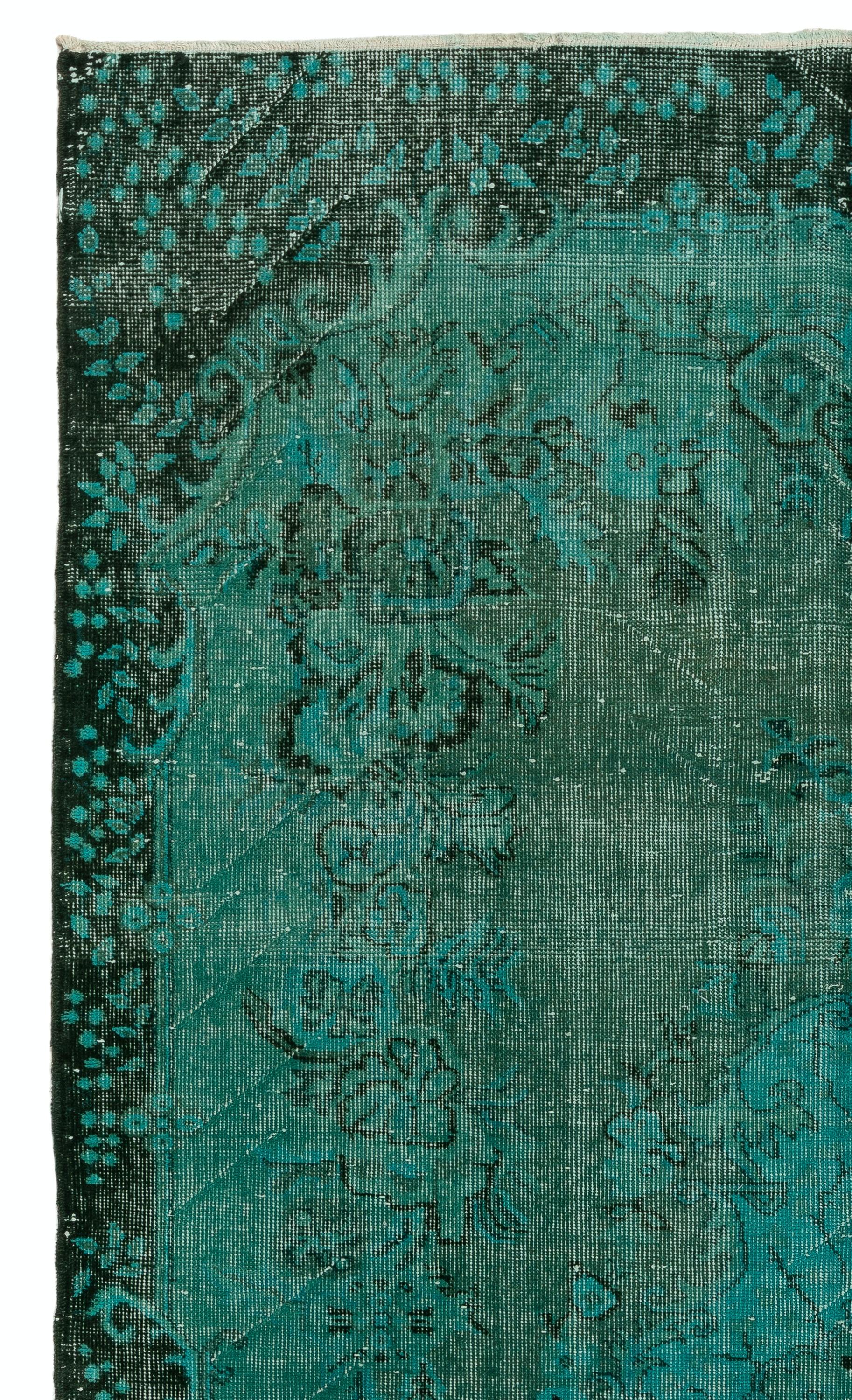 A vintage Turkish rug re-dyed in teal color.
Finely hand knotted, low wool pile on cotton foundation. Deep washed.
Sturdy and can be used on a high traffic area, suitable for both residential and commercial interiors. Measures: 5.6 x 9 Ft.