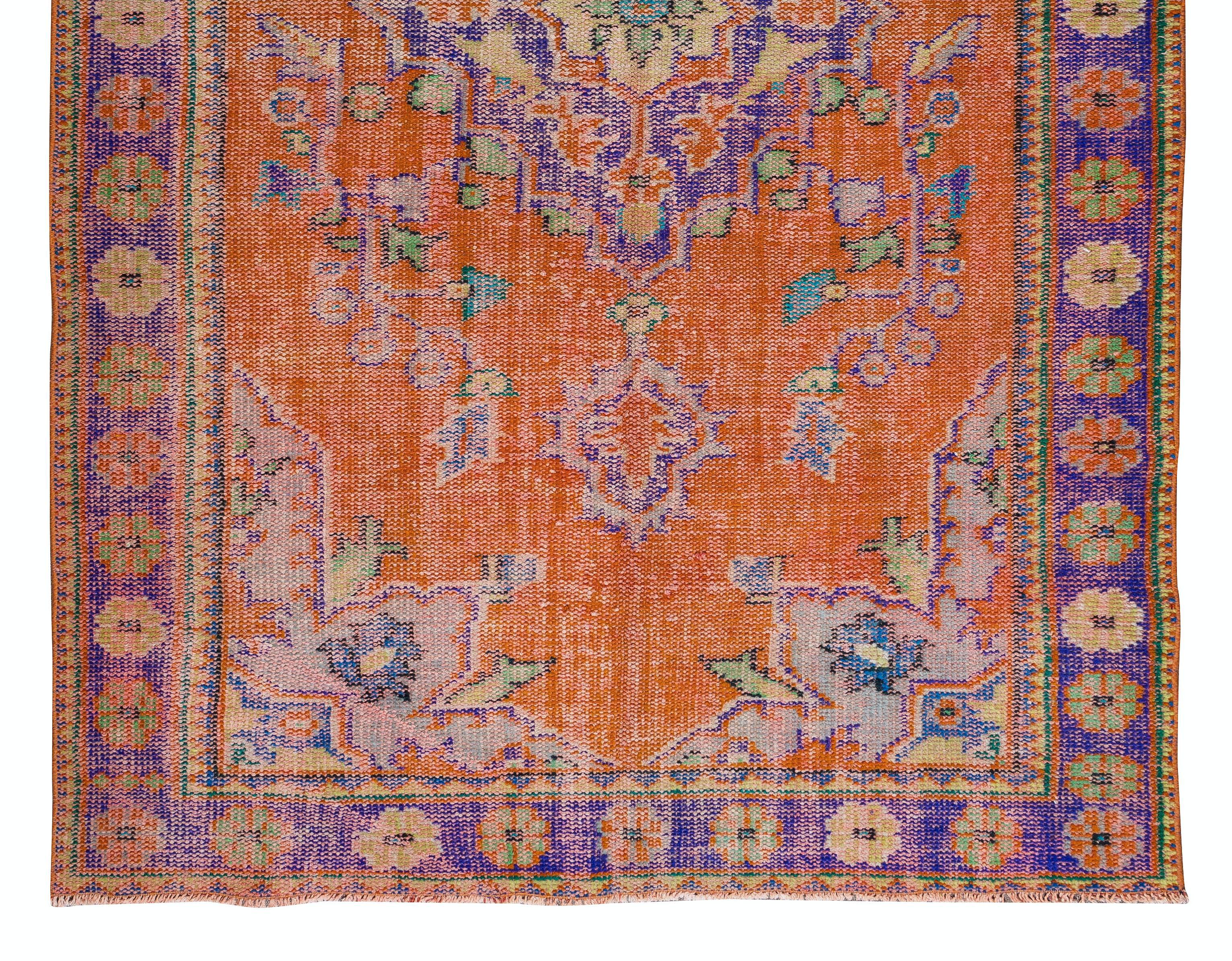 Tribal 5.6x9 Ft Handmade Anatolian Vintage Rug in Burnt Orange, Purple, Blue & Green For Sale