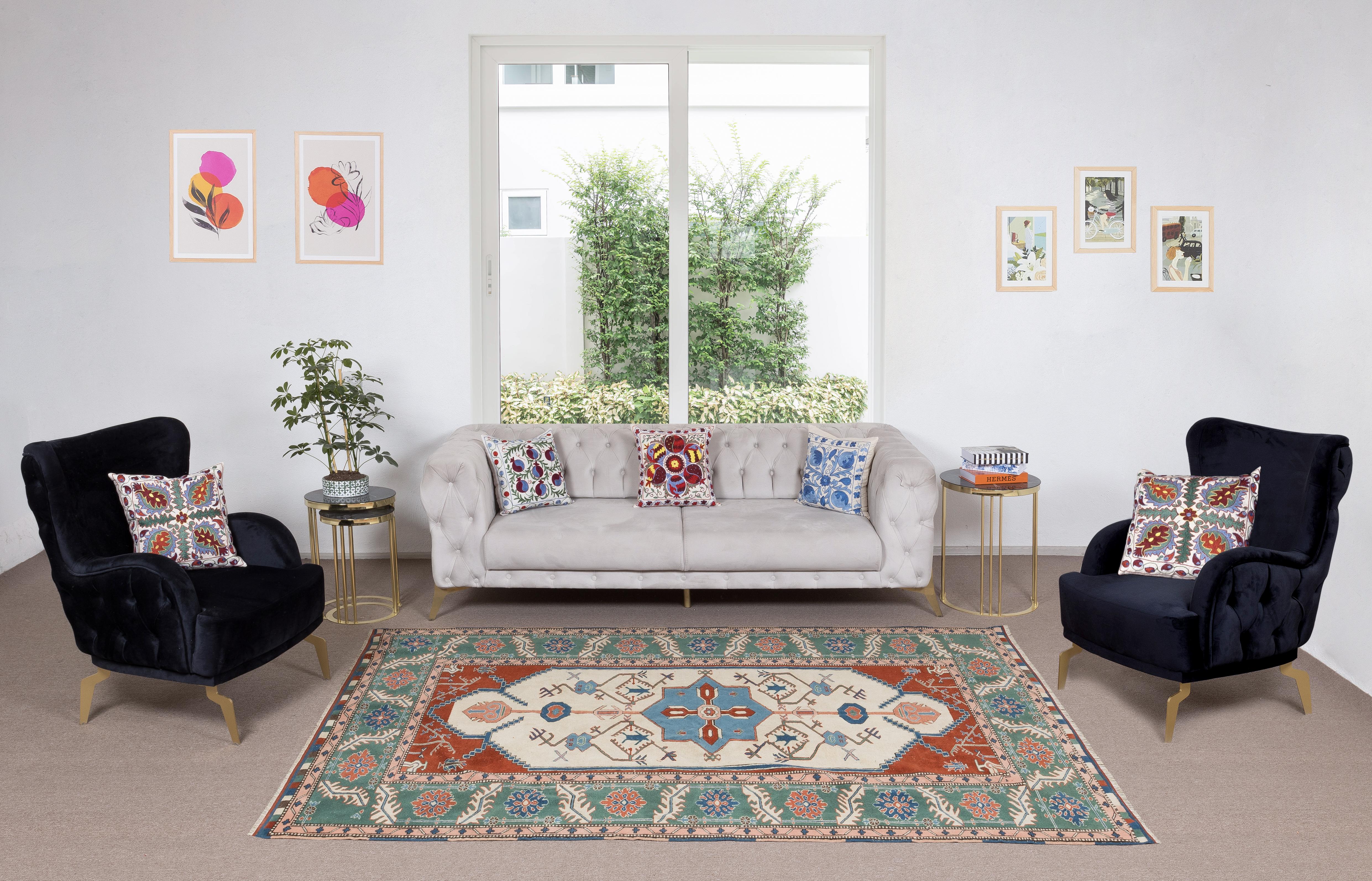 A finely hand-knotted vintage Turkish rug from 1960s featuring a geometric design. The rug is made of medium wool pile on wool foundation. It is heavy and lays flat on the floor, in very good condition with no issues. It has been washed