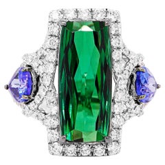 5,7 Karat beruhigender grüner Turmalin & 1,48 Karat intensiver blauer Tansanit 18K Ring
