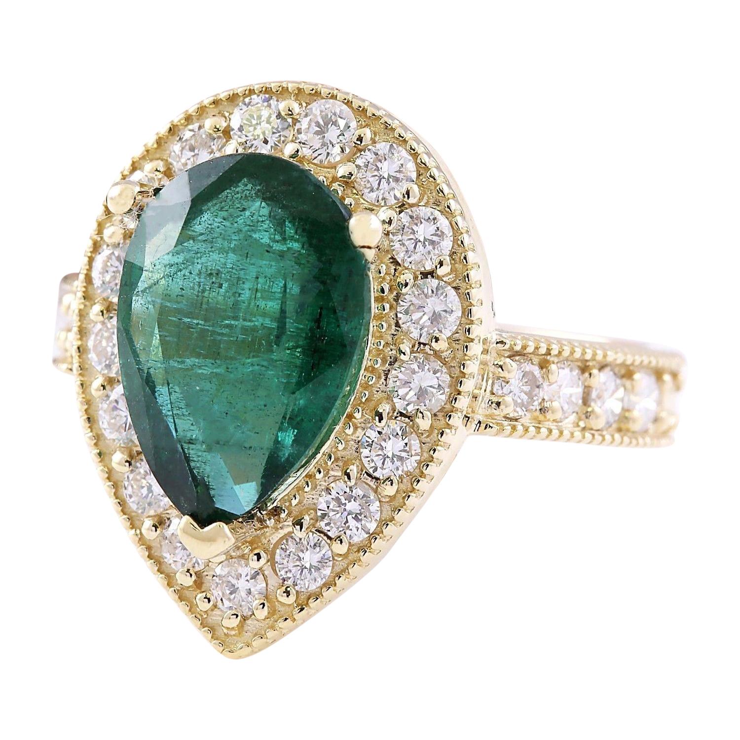5.70 Carat Natural Emerald 14K Solid Yellow Gold Diamond Ring
 Item Type: Ring
 Item Style: Engagement
 Material: 14K Yellow Gold
 Mainstone: Emerald
 Stone Color: Green
 Stone Weight: 4.50 Carat
 Stone Shape: Pear
 Stone Quantity: 1
 Stone