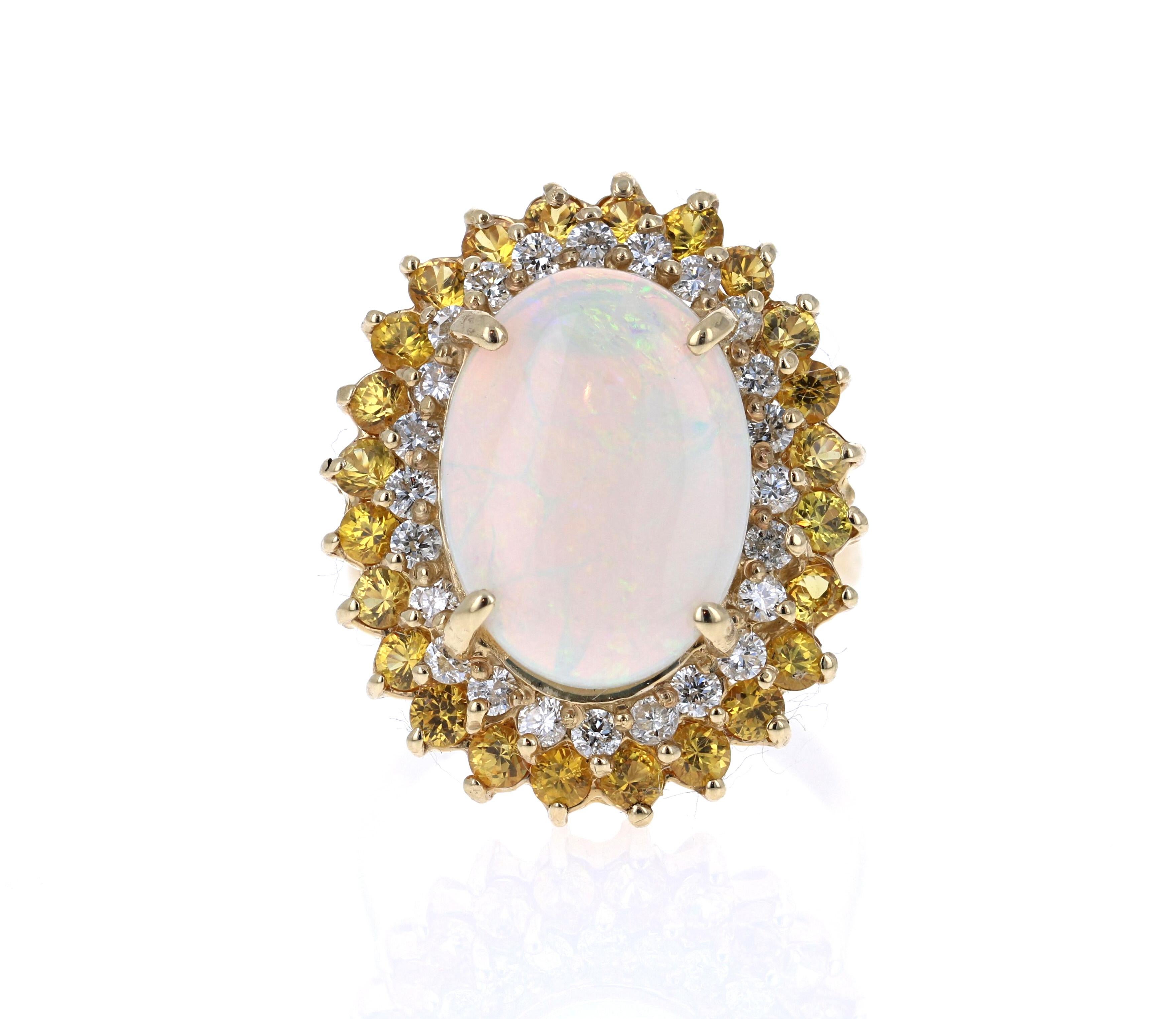 Contemporary 5.70 Carat Opal Yellow Sapphire and Diamond 14 Karat Yellow Gold Cocktail Ring For Sale