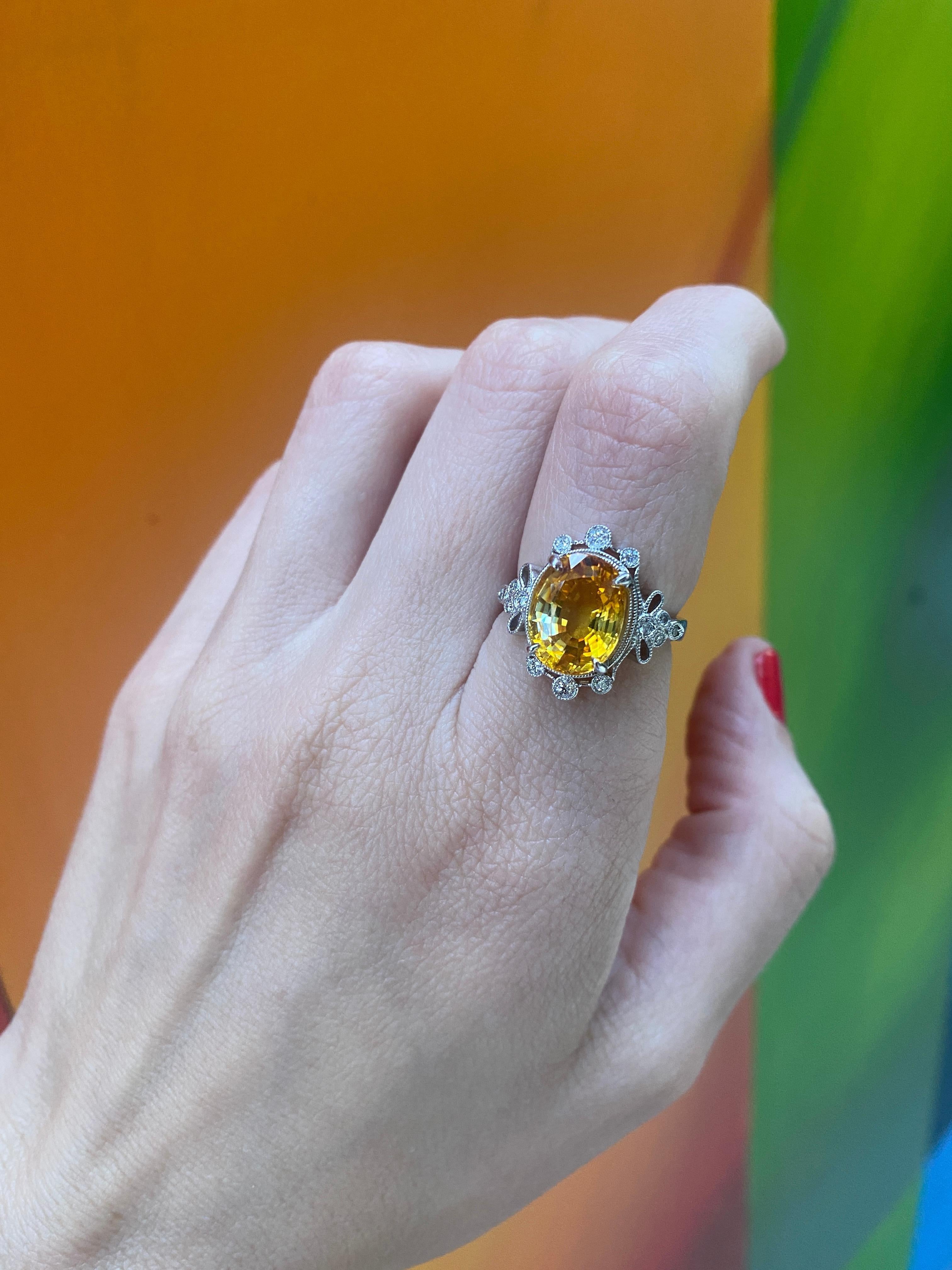 5.70 Carat Orange-Yellow Oval Cut Sapphire w/ 0.20ctw Diamond Accent Ring For Sale 6