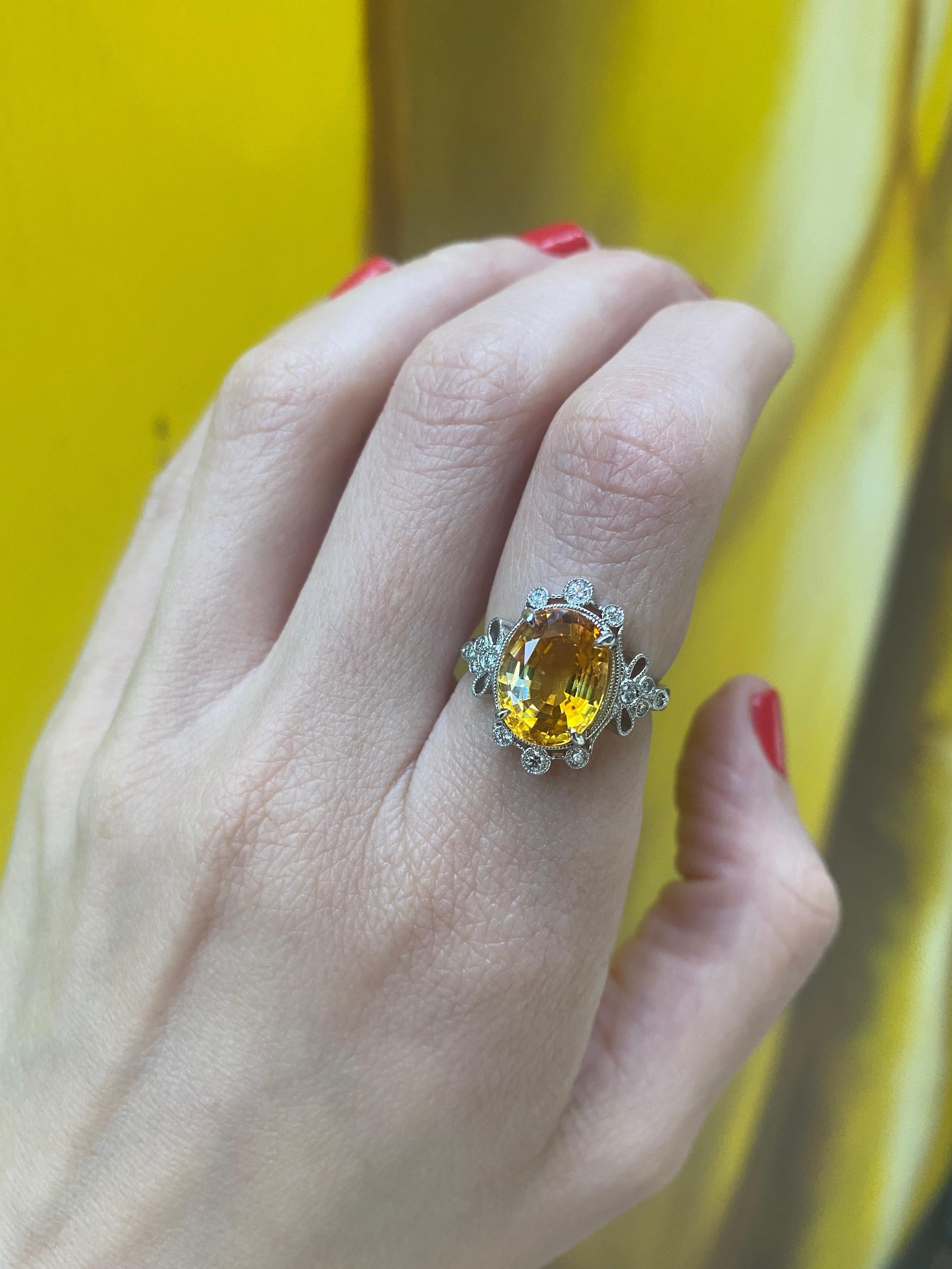 5.70 Carat Orange-Yellow Oval Cut Sapphire w/ 0.20ctw Diamond Accent Ring For Sale 4
