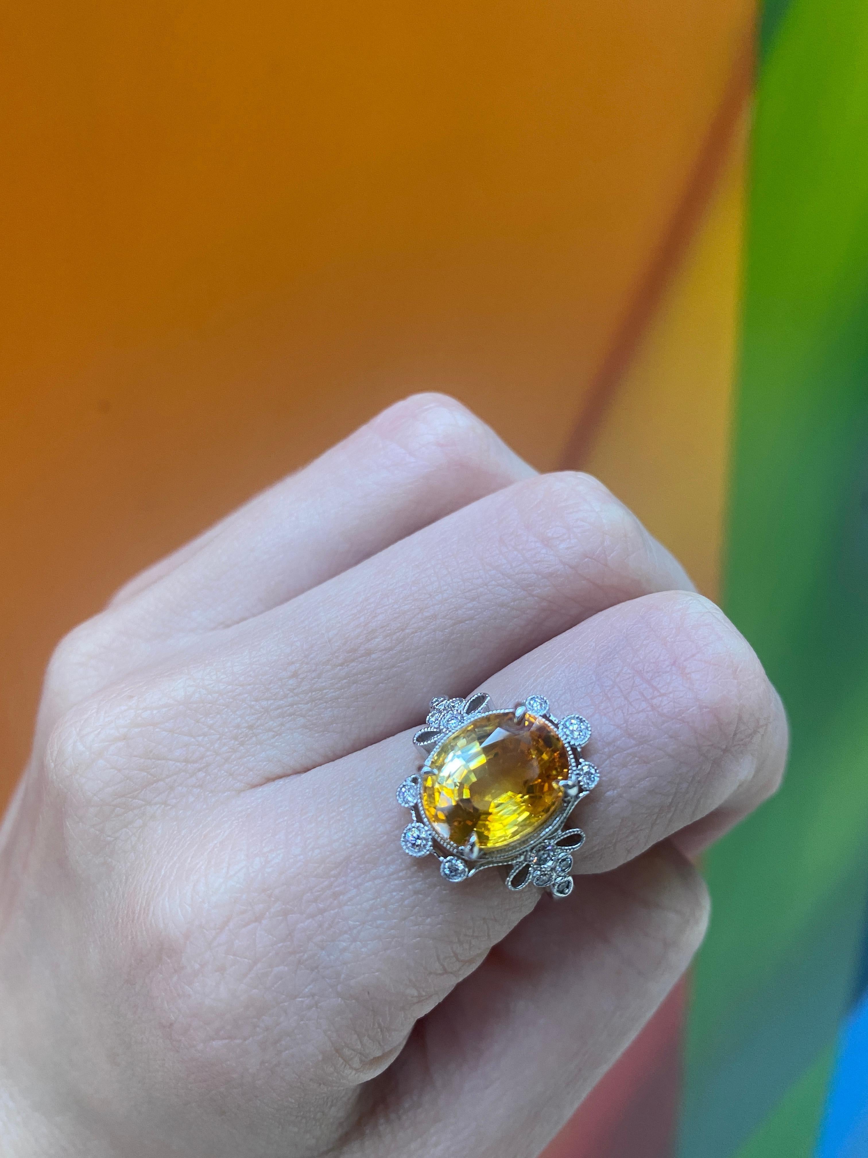 5.70 Carat Orange-Yellow Oval Cut Sapphire w/ 0.20ctw Diamond Accent Ring For Sale 5