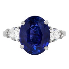 Bague de fiançailles en platine avec saphir bleu ovale de 5,70 carats et diamants