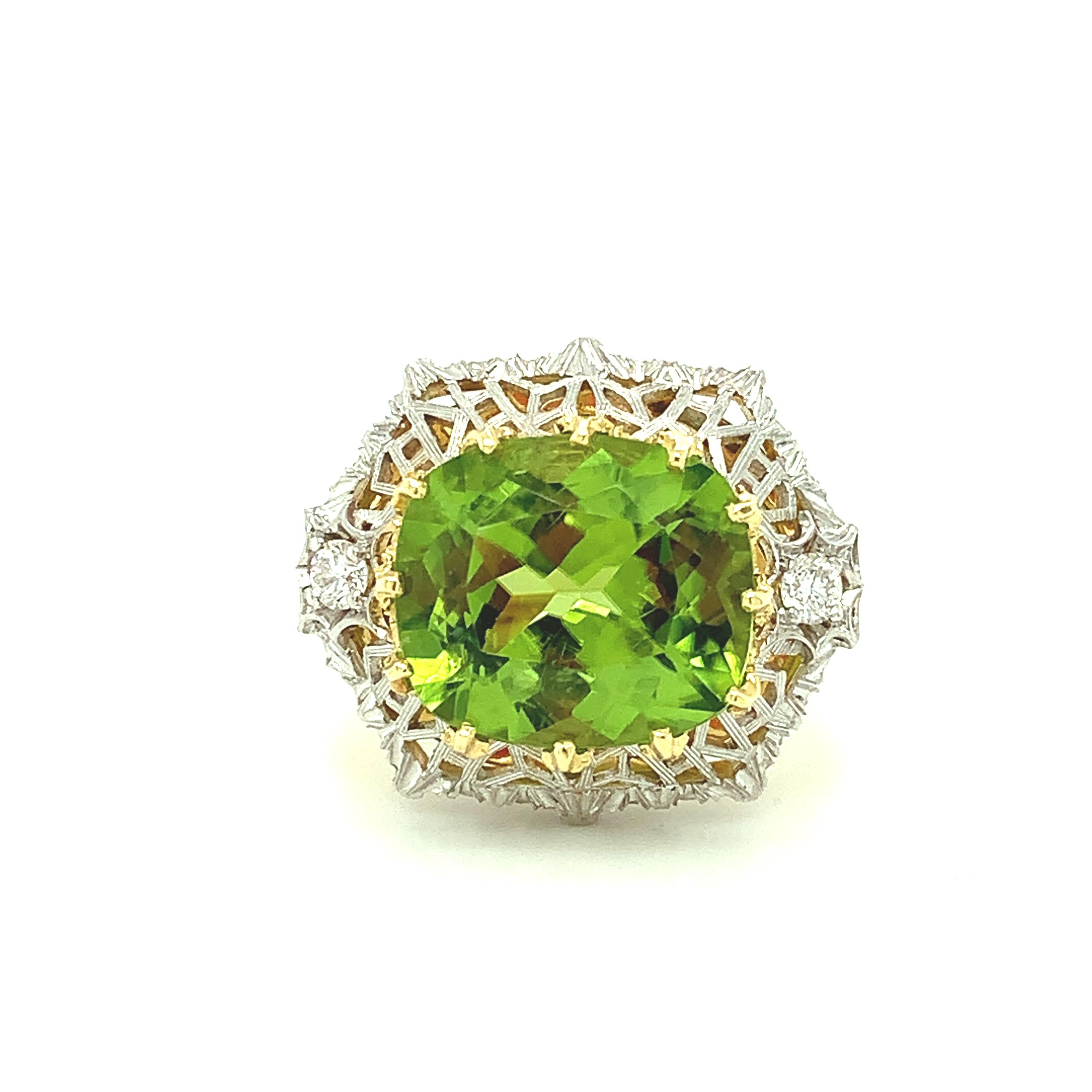 A velvety, grass-green, cushion-cut peridot is showcased in this beautiful, Florentine style ring. The center peridot is set horizontally, surrounded by an intricately-pierced, white gold design that sits atop a brushed finished yellow gold band.