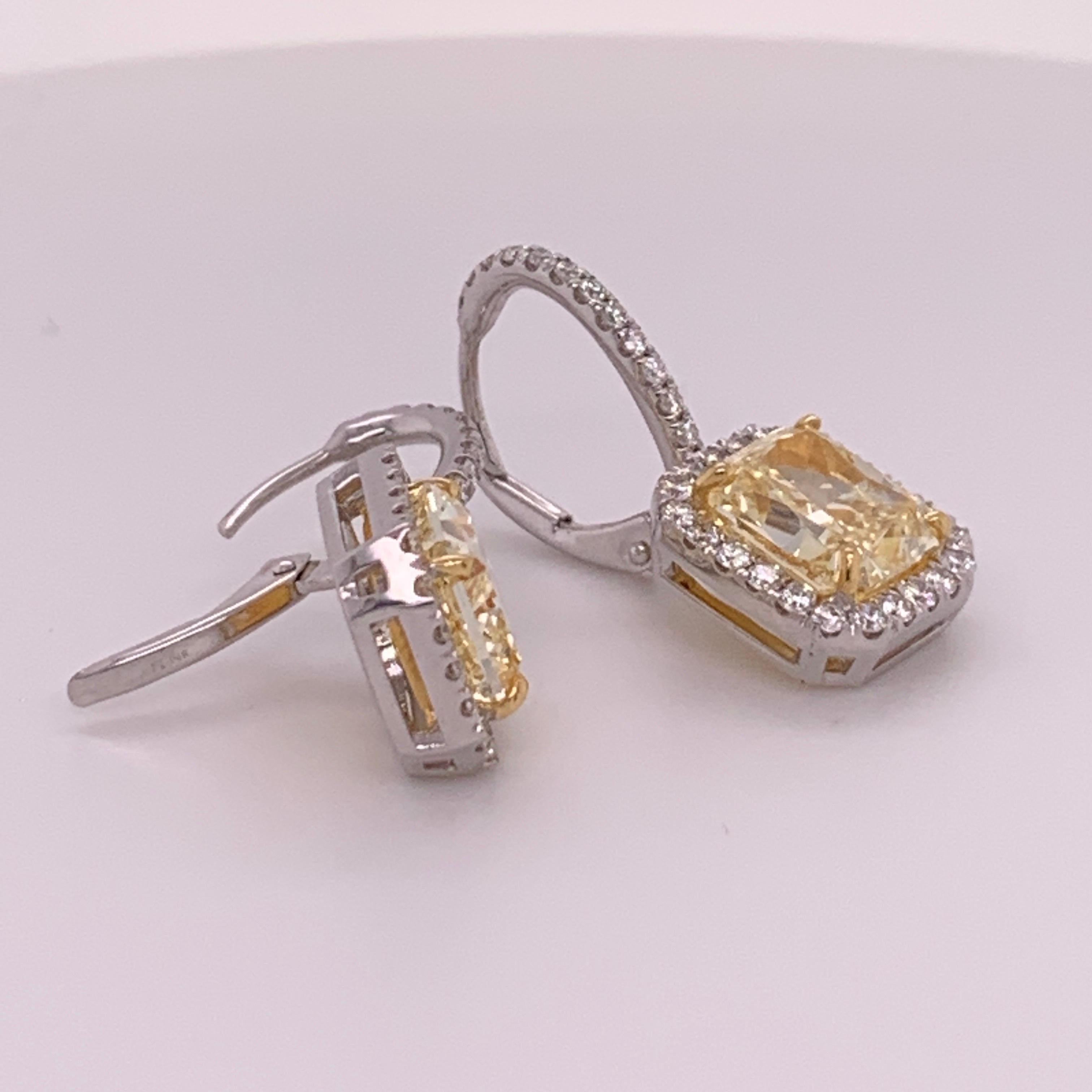 Women's GIA 5.70 Carat Platinum and Gold Radiant Fancy Light Yellow Diamond Earrings VVS