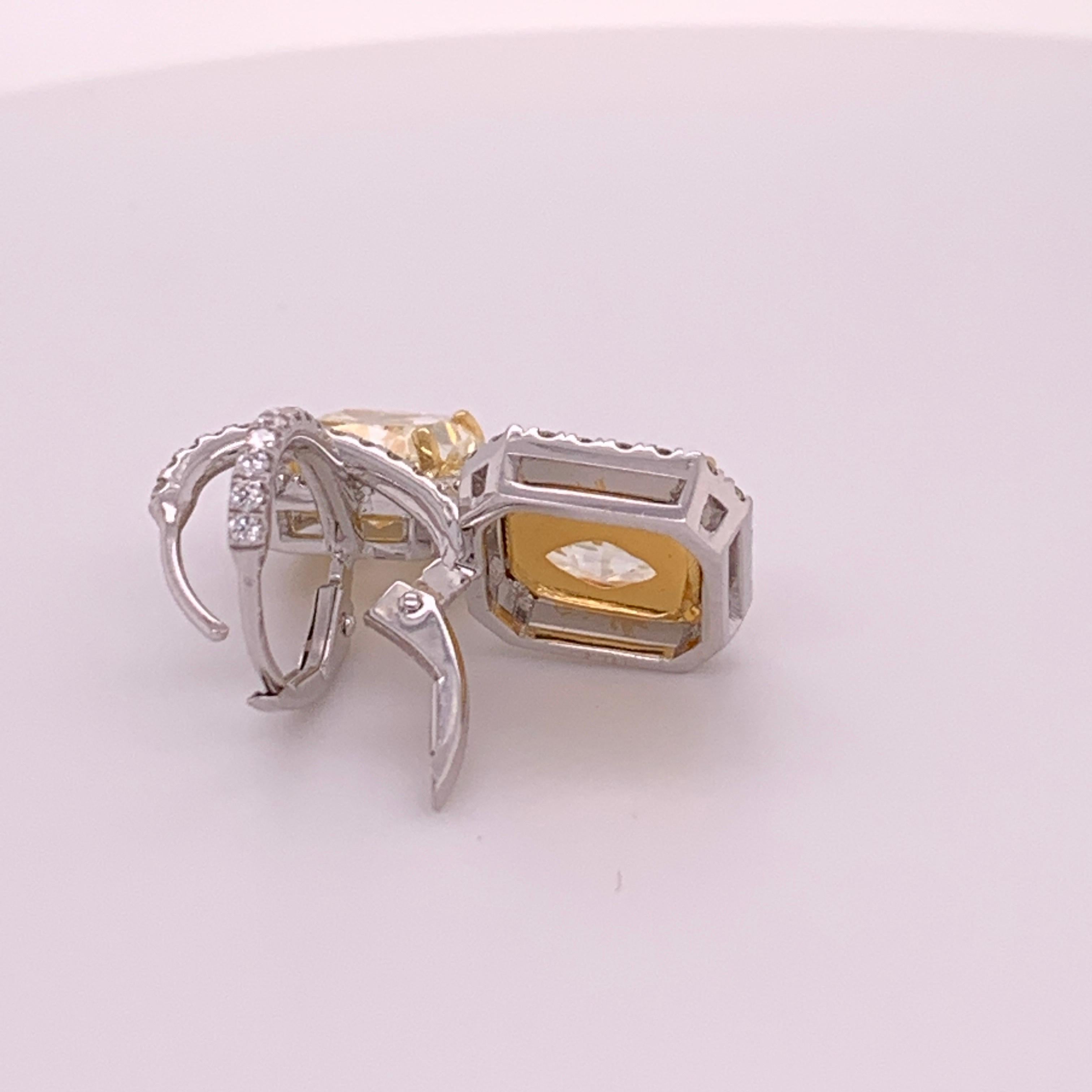 GIA 5.70 Carat Platinum and Gold Radiant Fancy Light Yellow Diamond Earrings VVS 1