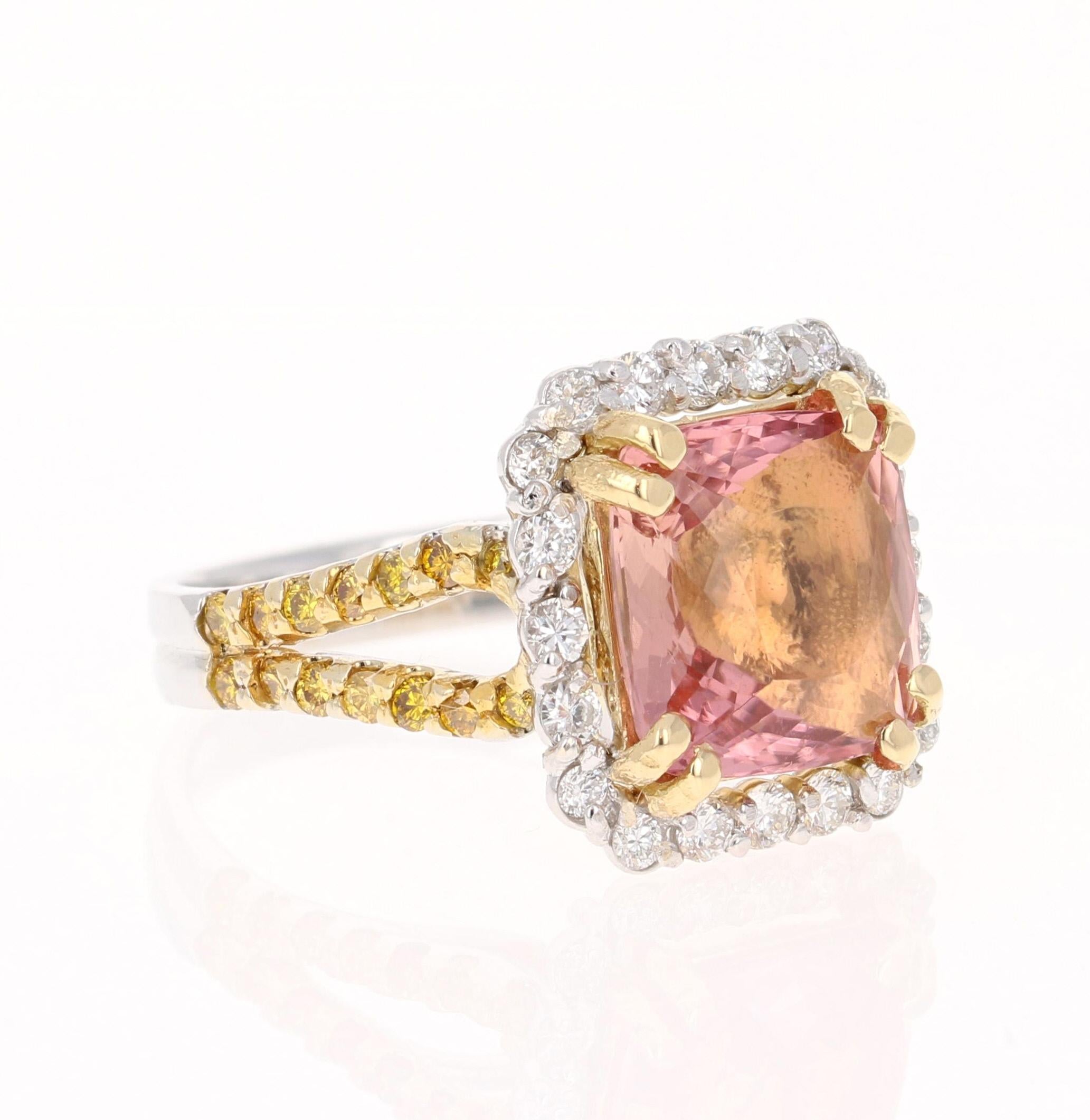 A unique beauty that is sure to be a rare piece! 

This stunner has a gorgeous Square Cushion Cut Tourmaline that weighs 4.77 Carats. It is surrounded by 20 Round Cut Diamonds that weigh 0.50 Carats (Clarity: VS, Color: H) It is also embellished