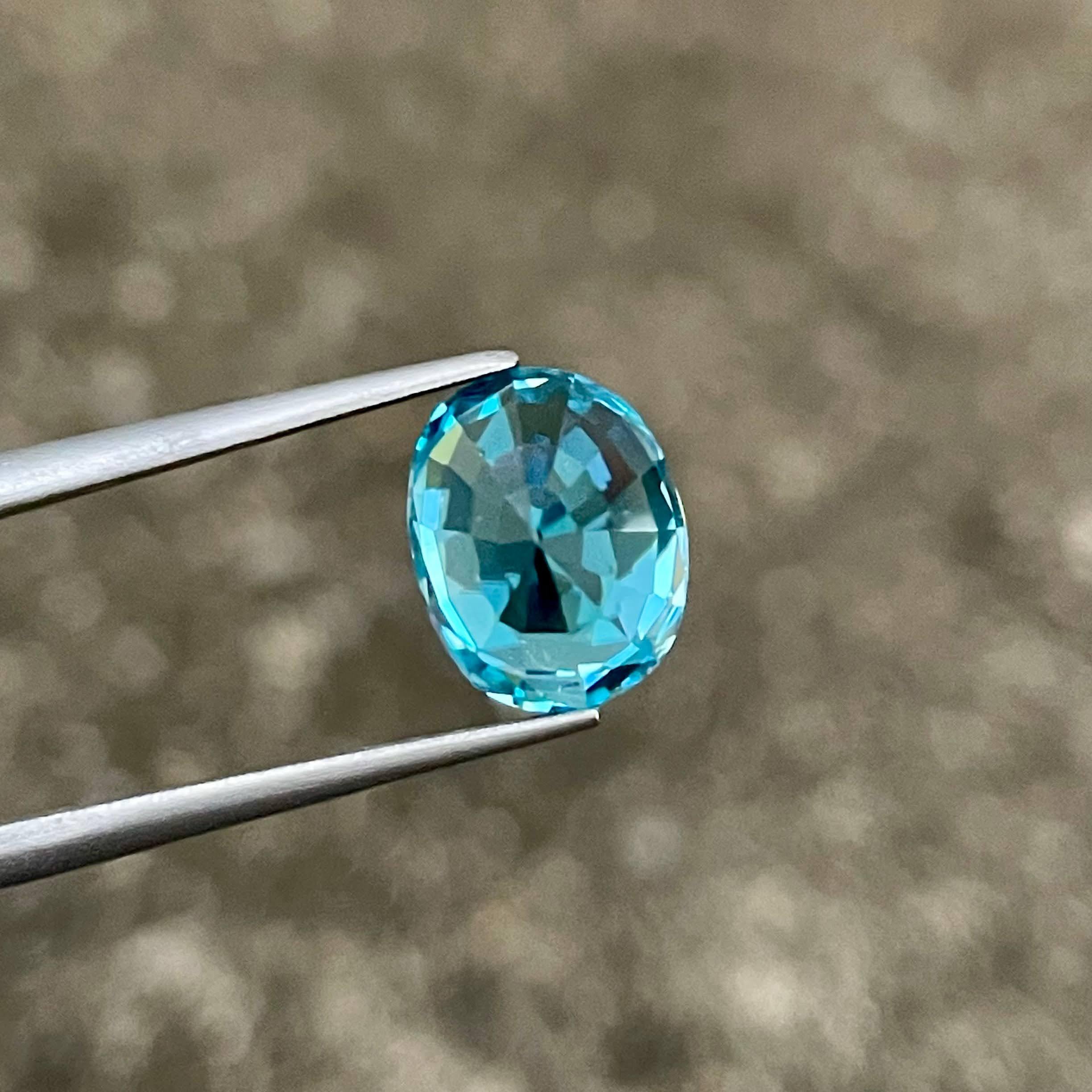 Modern 5.70 carats Electric Blue Zircon Stone Oval Cut Cambodian Gemstone For Sale