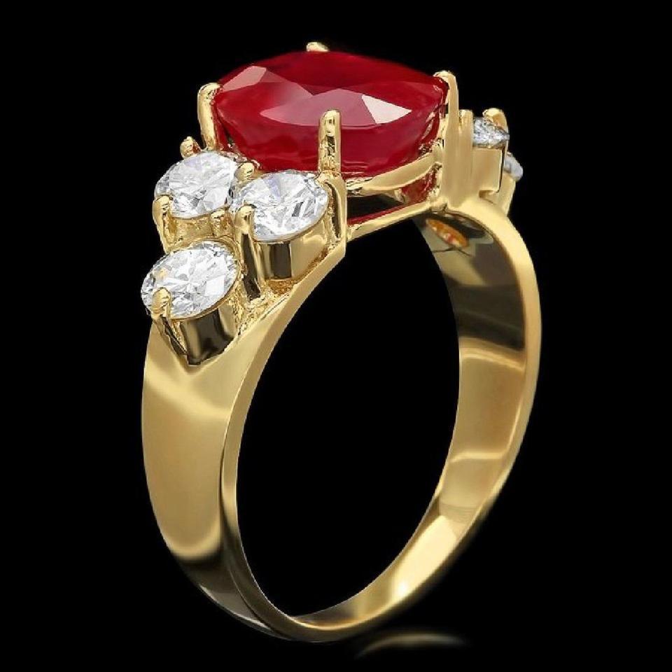 5.70 Carats Impressive Red Ruby and Natural Diamond 14K Yellow Gold Ring

Total Red Ruby Weight is: Approx. 4.50 Carats

Ruby Treatment: Lead Glass Filling

Ruby Measures: Approx. 10.00 x 8.00mm

Natural Round Diamonds Weight: Approx. 1.20 Carats