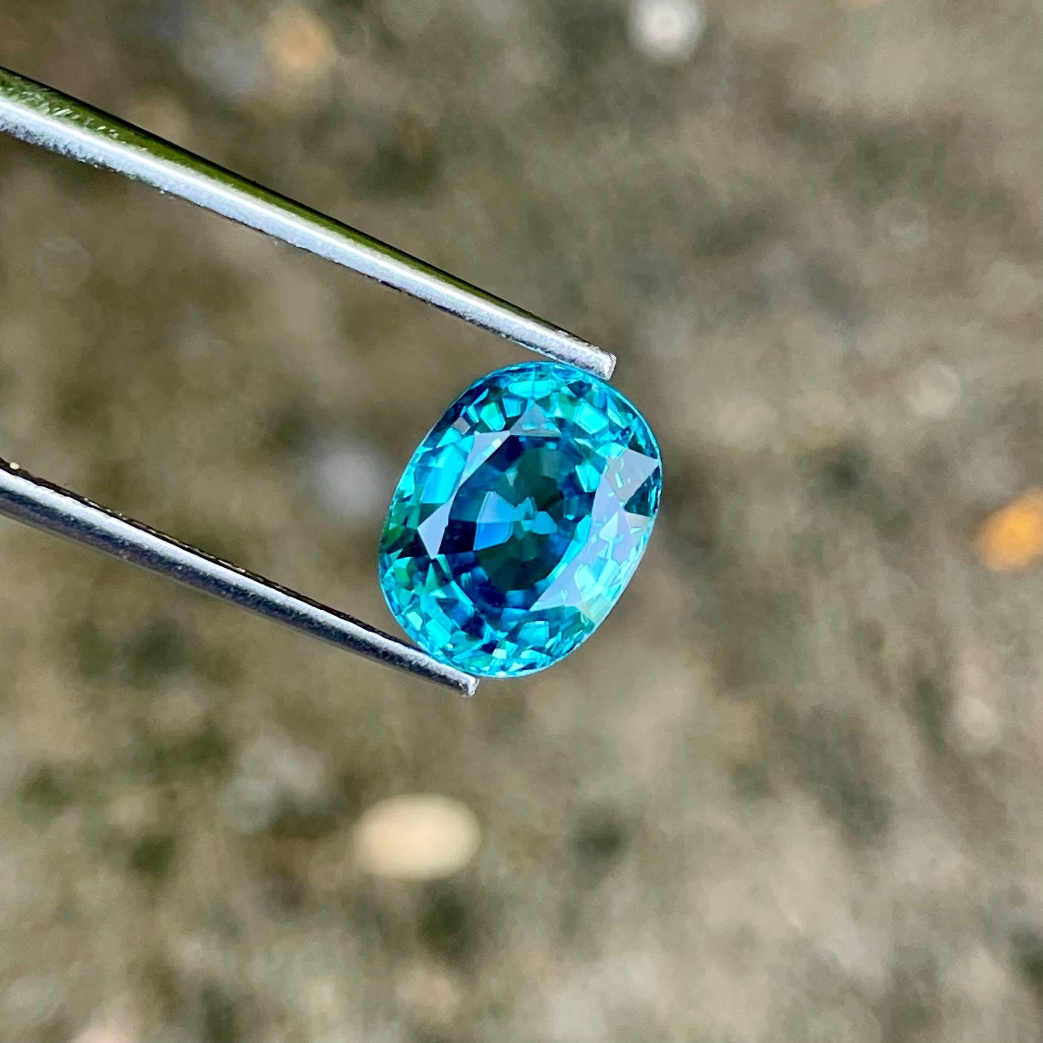 Women's or Men's 5.70 carats Loose Blue Zircon Stone Oval Cut Natural Cambodian Gemstone For Sale