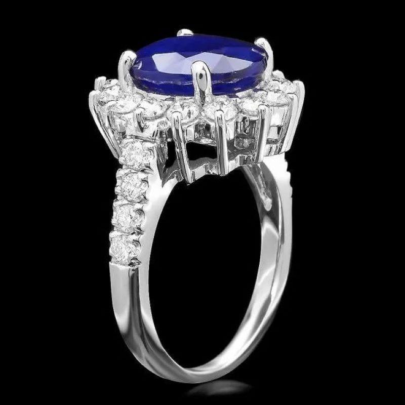 5.70 Carats Natural Blue Sapphire and Diamond 14K Solid White Gold Ring

Total Blue Sapphire Weight is: Approx. 4.70 Carats

Natural Sapphire Measures: Approx. 11.00 x 9.00mm

Sapphire treatment: Diffusion

Natural Round Diamonds Weight: Approx.