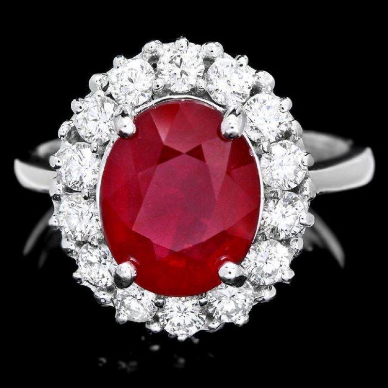 5.70 Carats Impressive Natural Red Ruby and Diamond 14K White Gold Ring

Total Red Ruby Weight is: Approx. 4.80 Carats

Ruby Measures: Approx. 11.00 x 9.00mm

Ruby treatment: Fracture Filling

Natural Round Diamonds Weight: Approx. 0.90 Carats