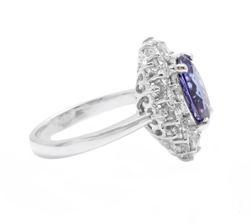 Oval Cut 5.70 Carat Natural Tanzanite and Diamond 14 Karat Solid White Gold Ring For Sale